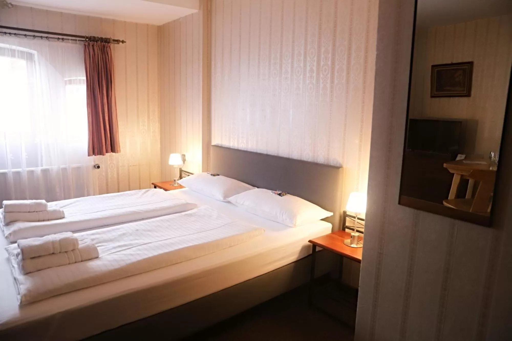 Bed in Hotel Schwarzer Adler