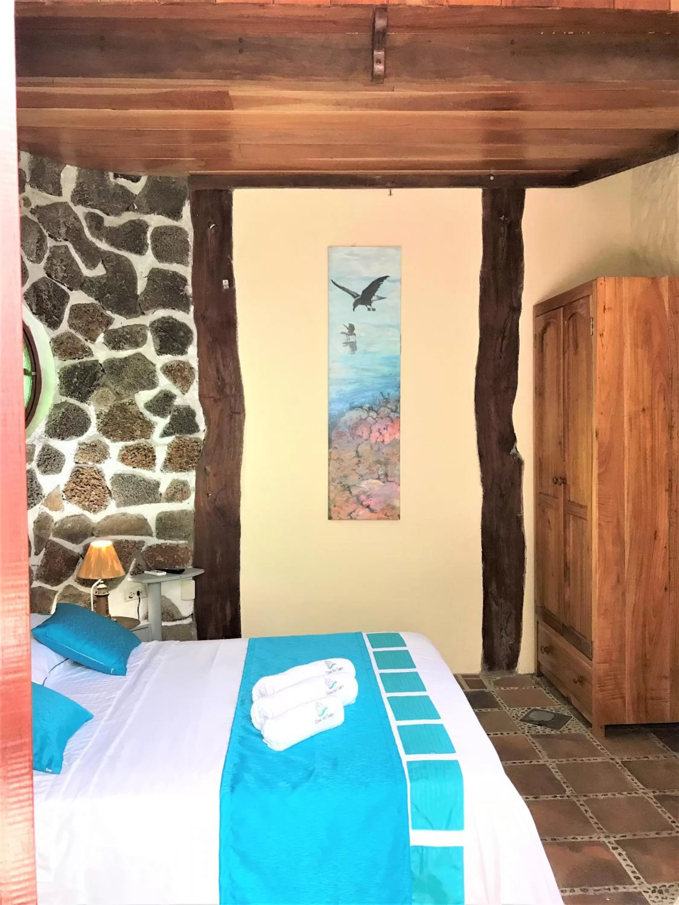 Bed in Casa del Lago Lodging House