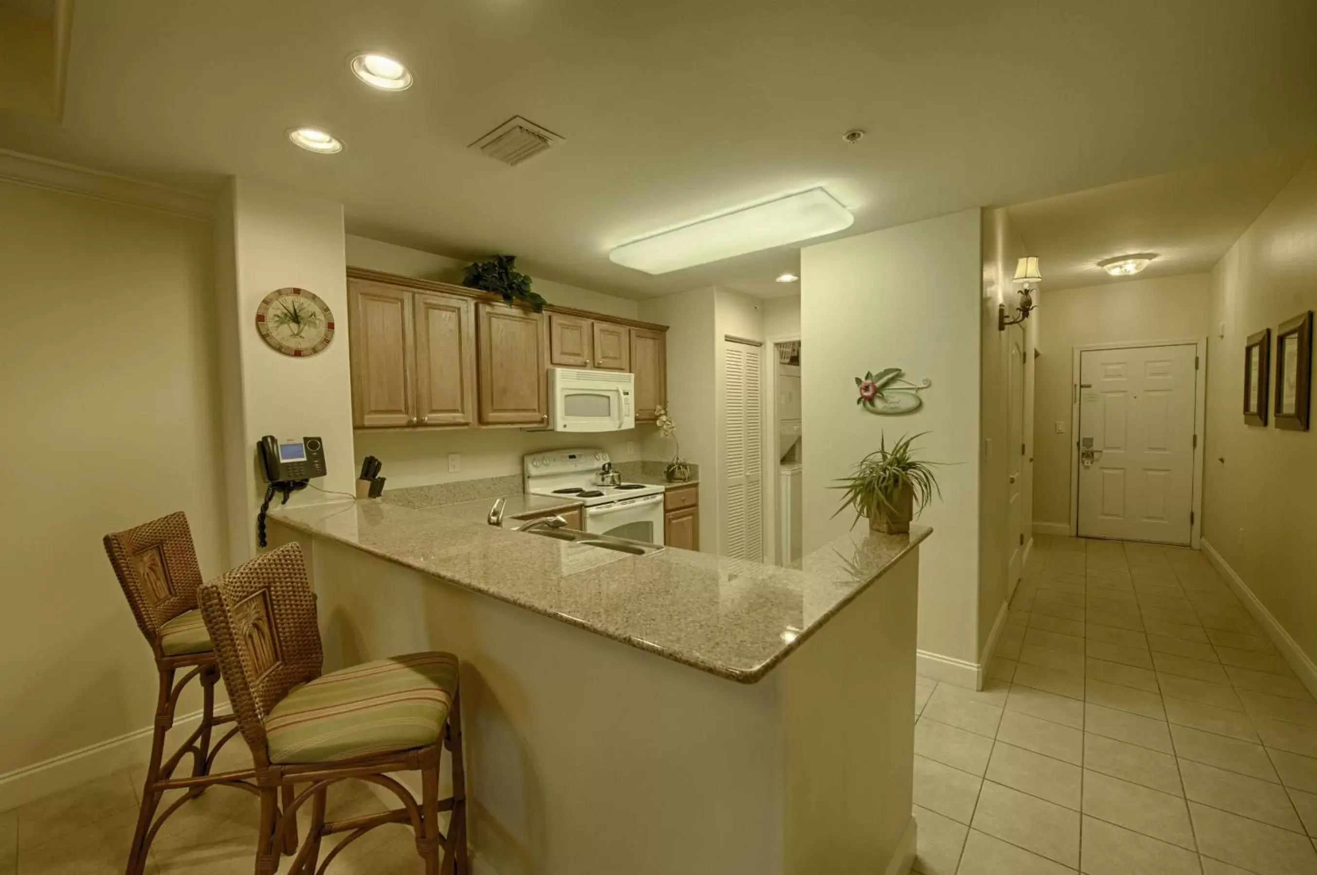 Kitchen or kitchenette, Bathroom in Blue Heron Beach Resort