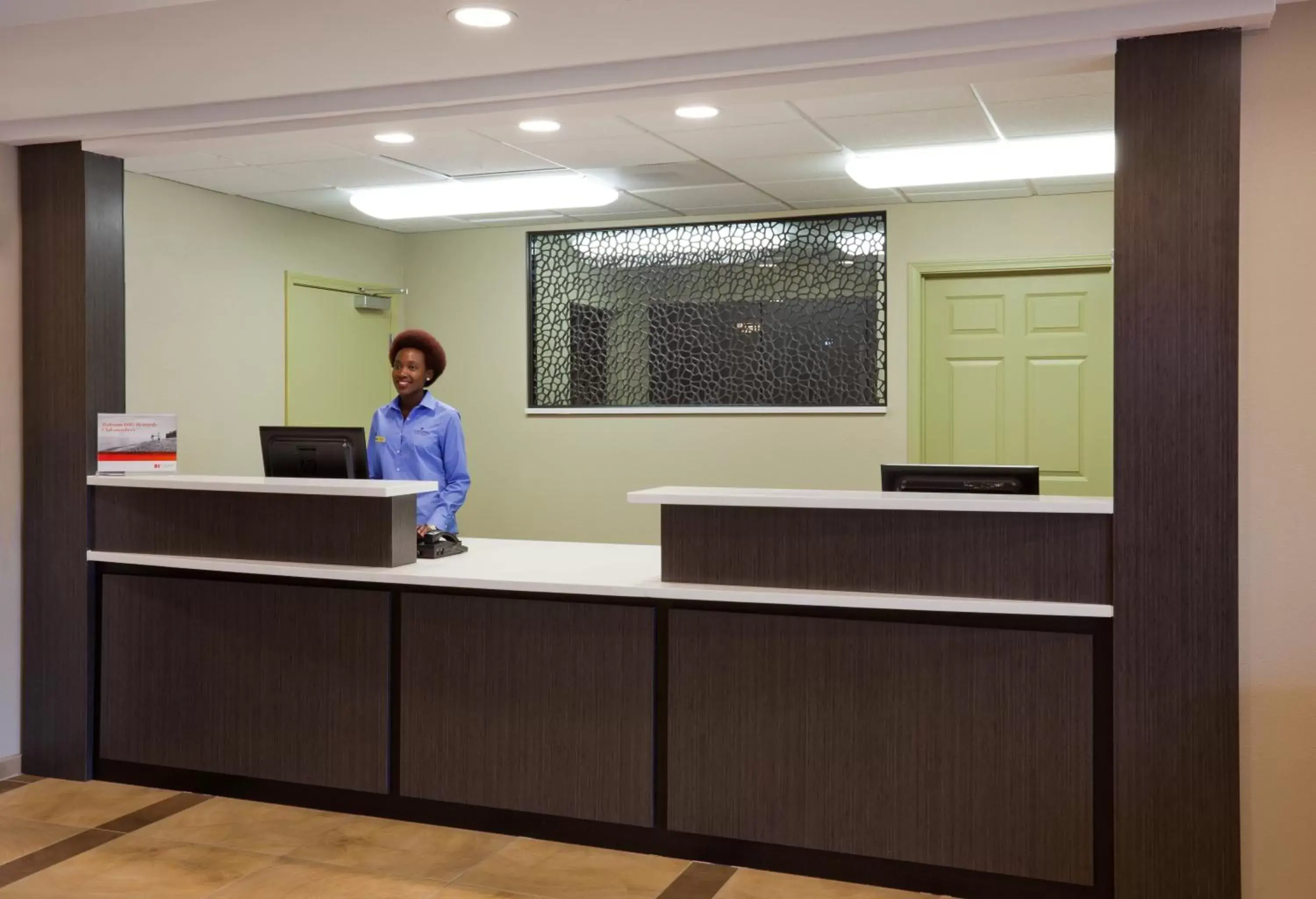 Property building, Lobby/Reception in Candlewood Suites Dickinson, an IHG Hotel