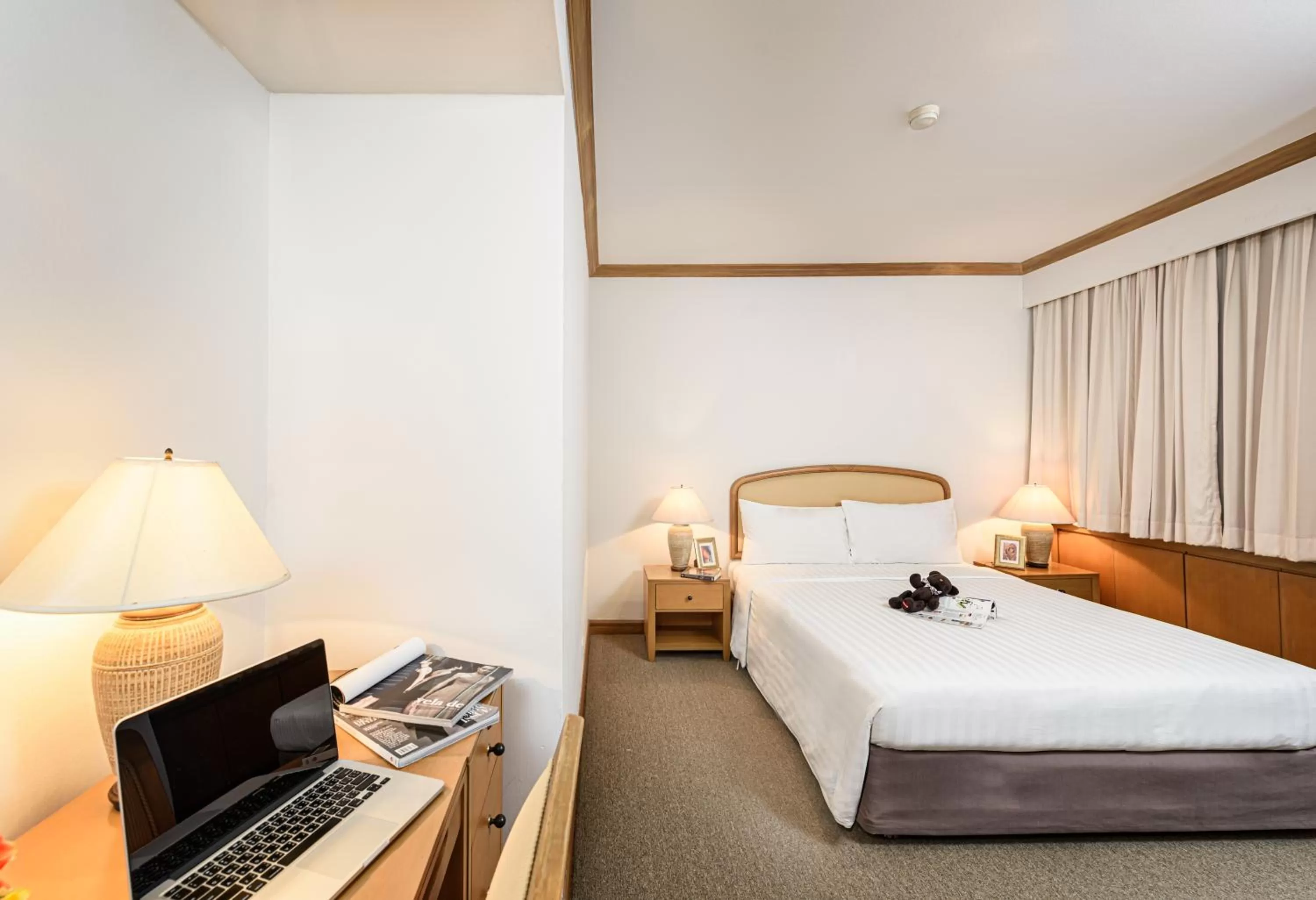 Bed in Riverine Place Hotel and Residence