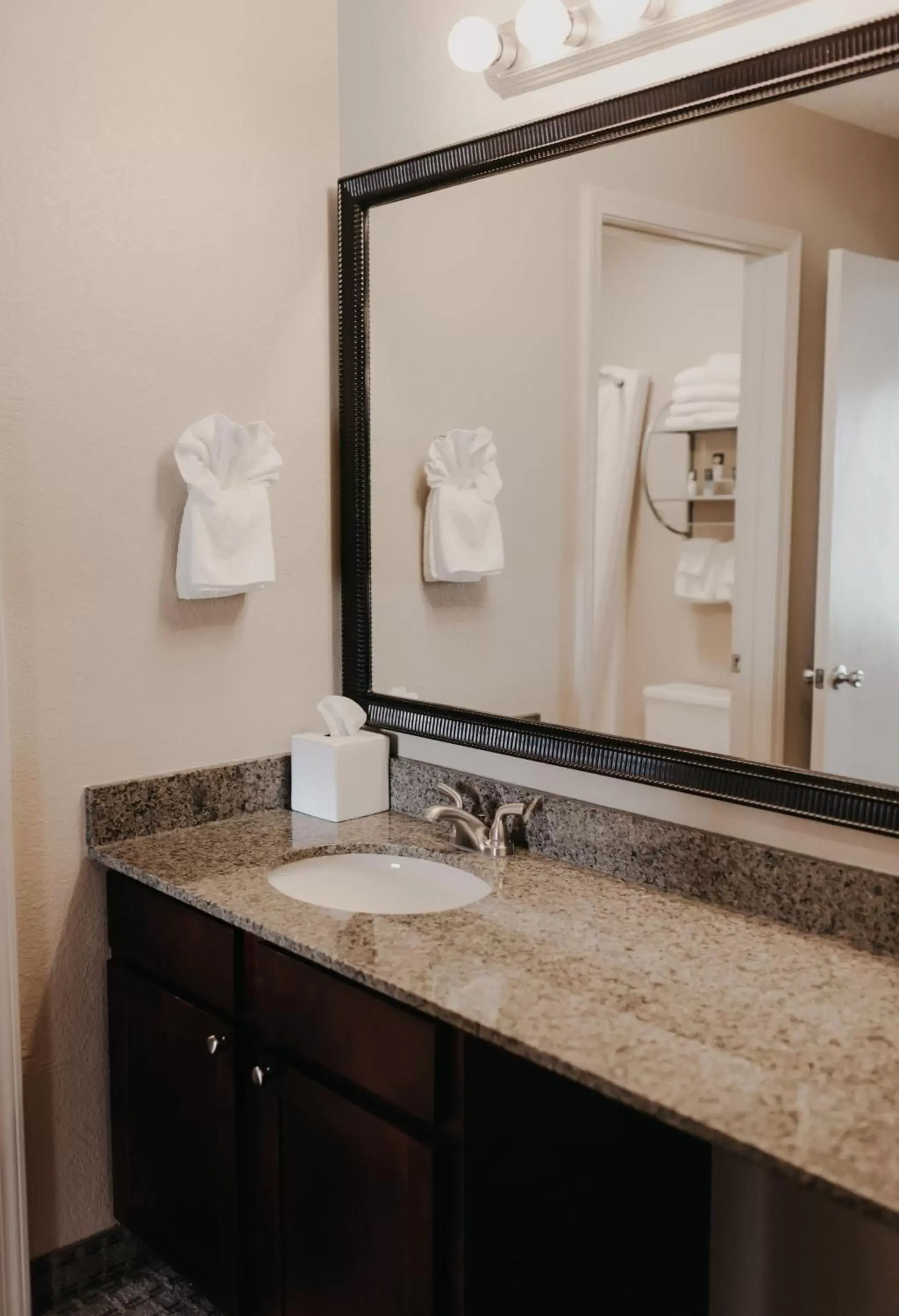 Bathroom in Eastland Suites Hotel & Conference Center