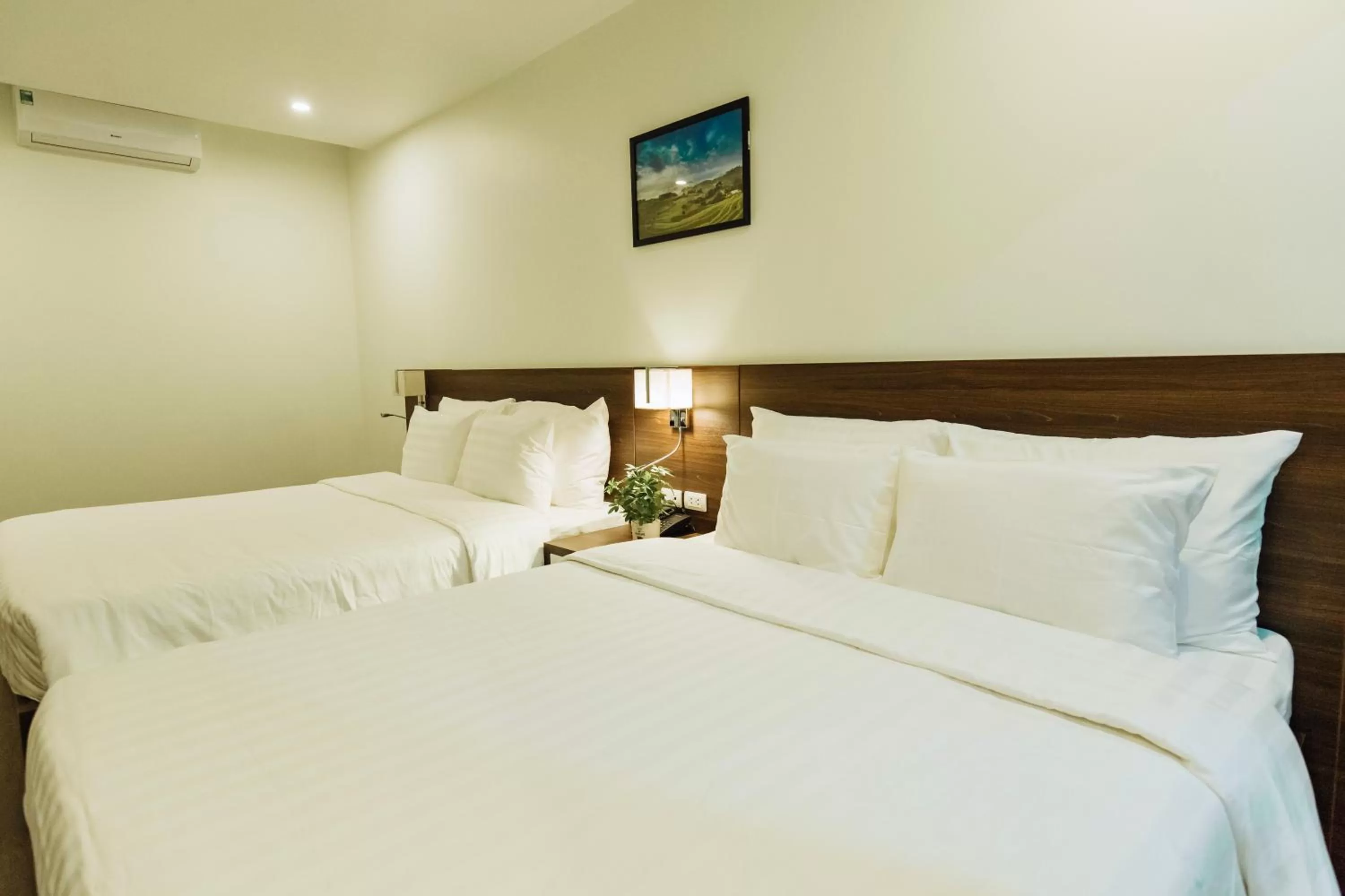 Bed in Paragon Noi bai Hotel & Pool