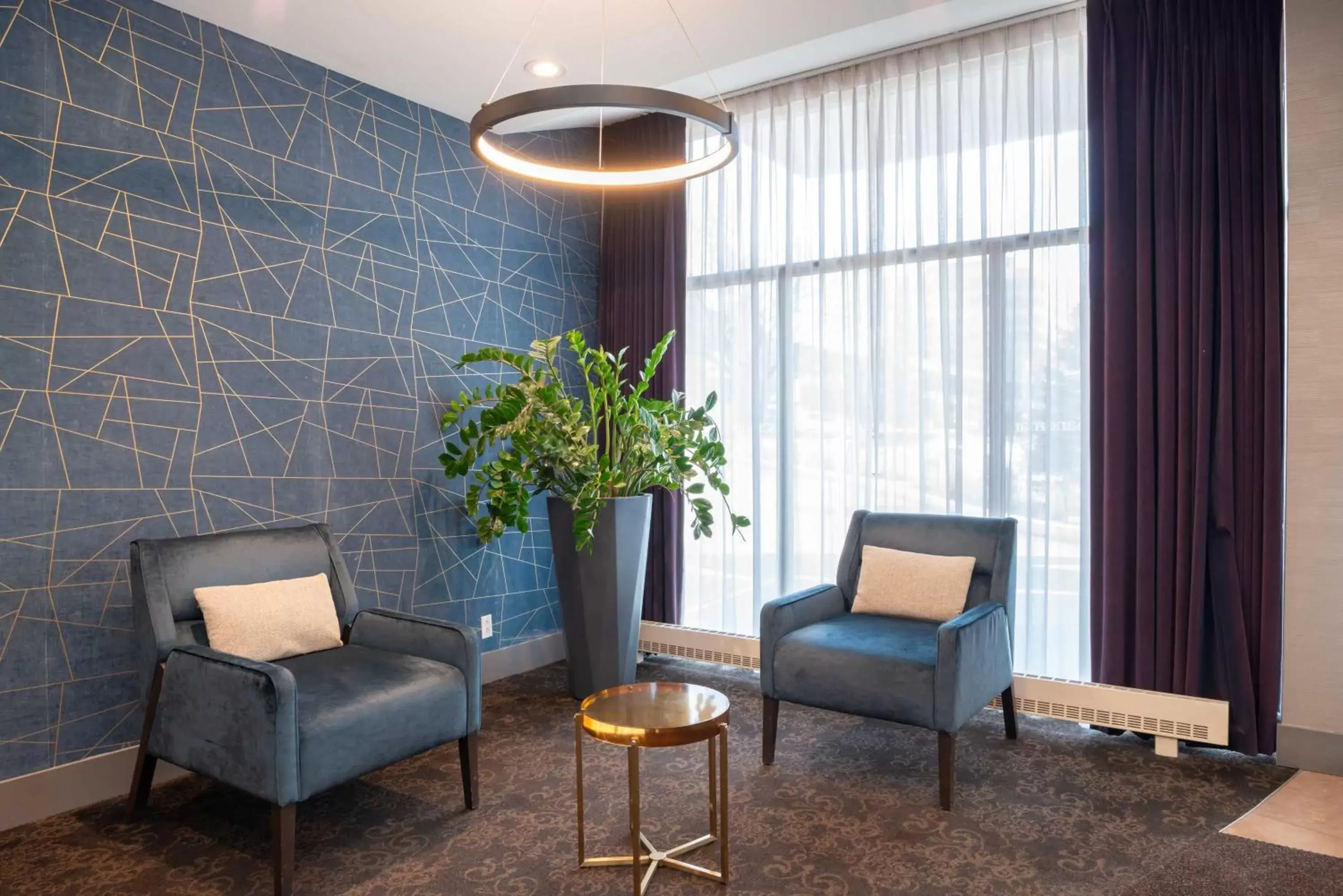 Lobby or reception, Seating Area in Sandman Hotel Montreal - Longueuil