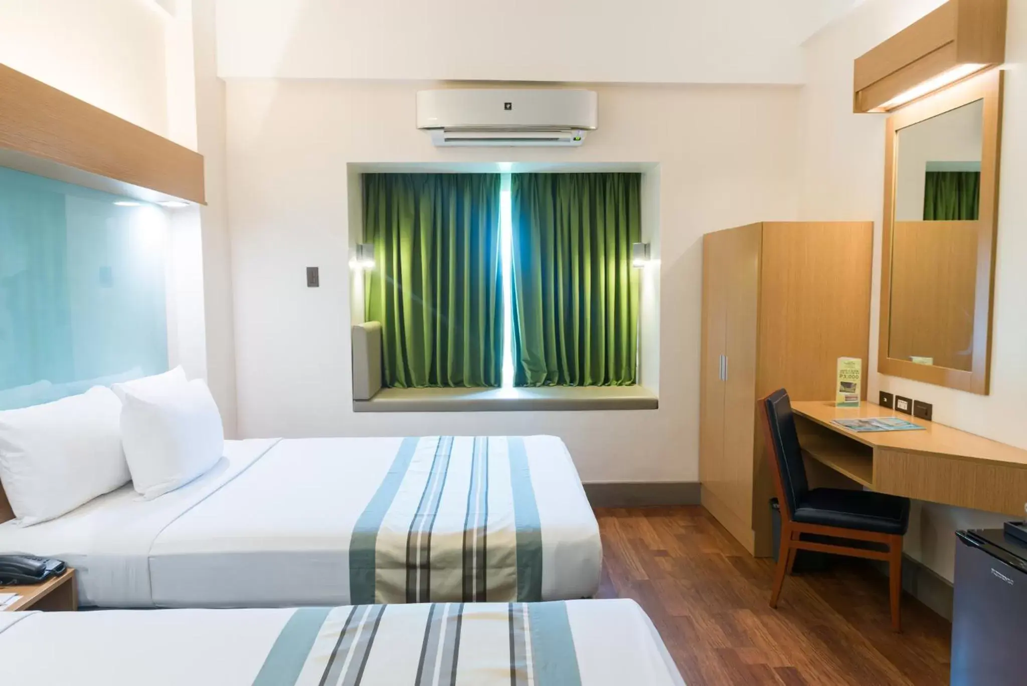 Bedroom, Bed in Microtel by Wyndham South Forbes