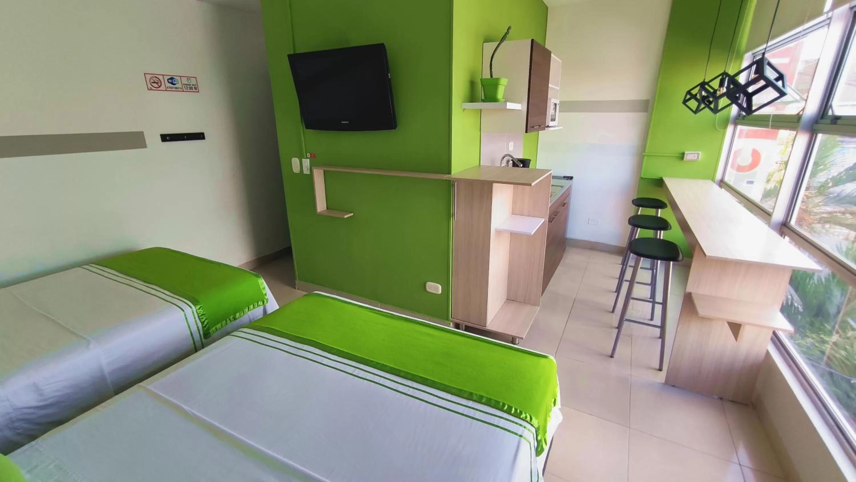 Bed in HOTEL COLOURS Cali