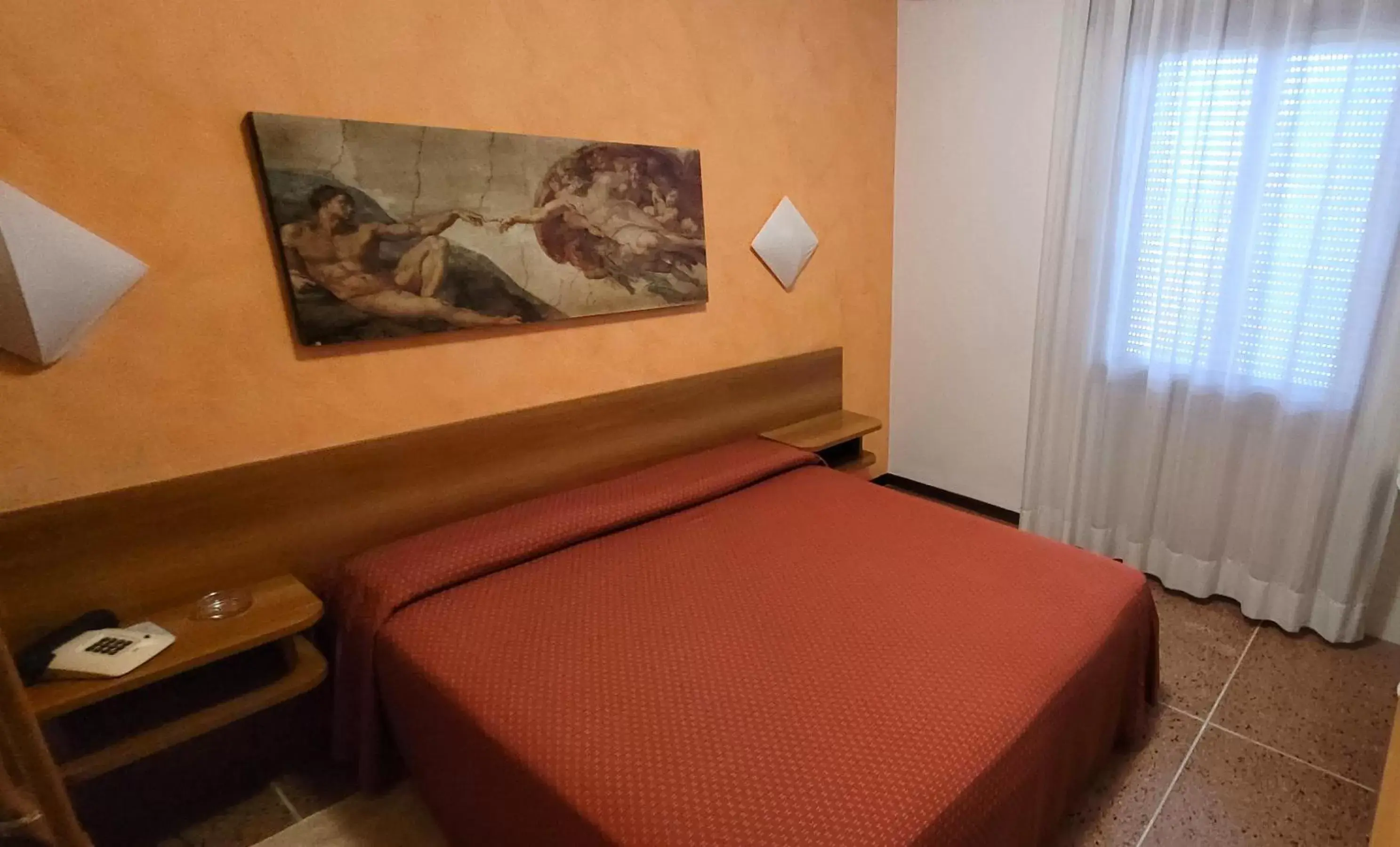 Bed in HOTEL PARADISO