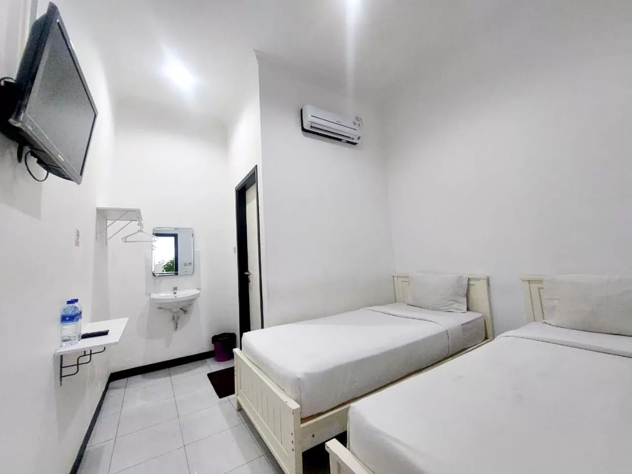 Bed in COZY STAY KUPANG