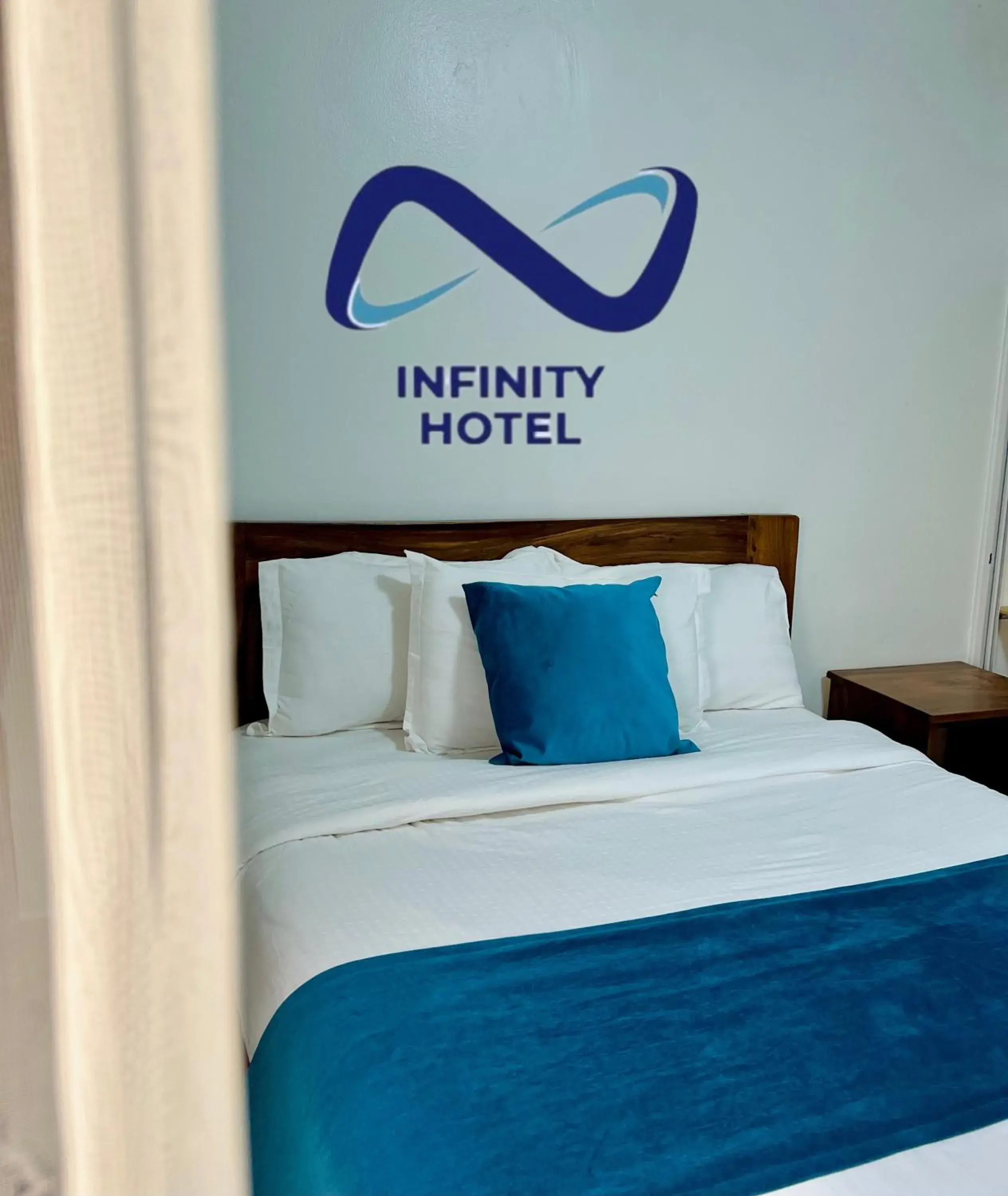 Bed in Infinity Hotel Kampala