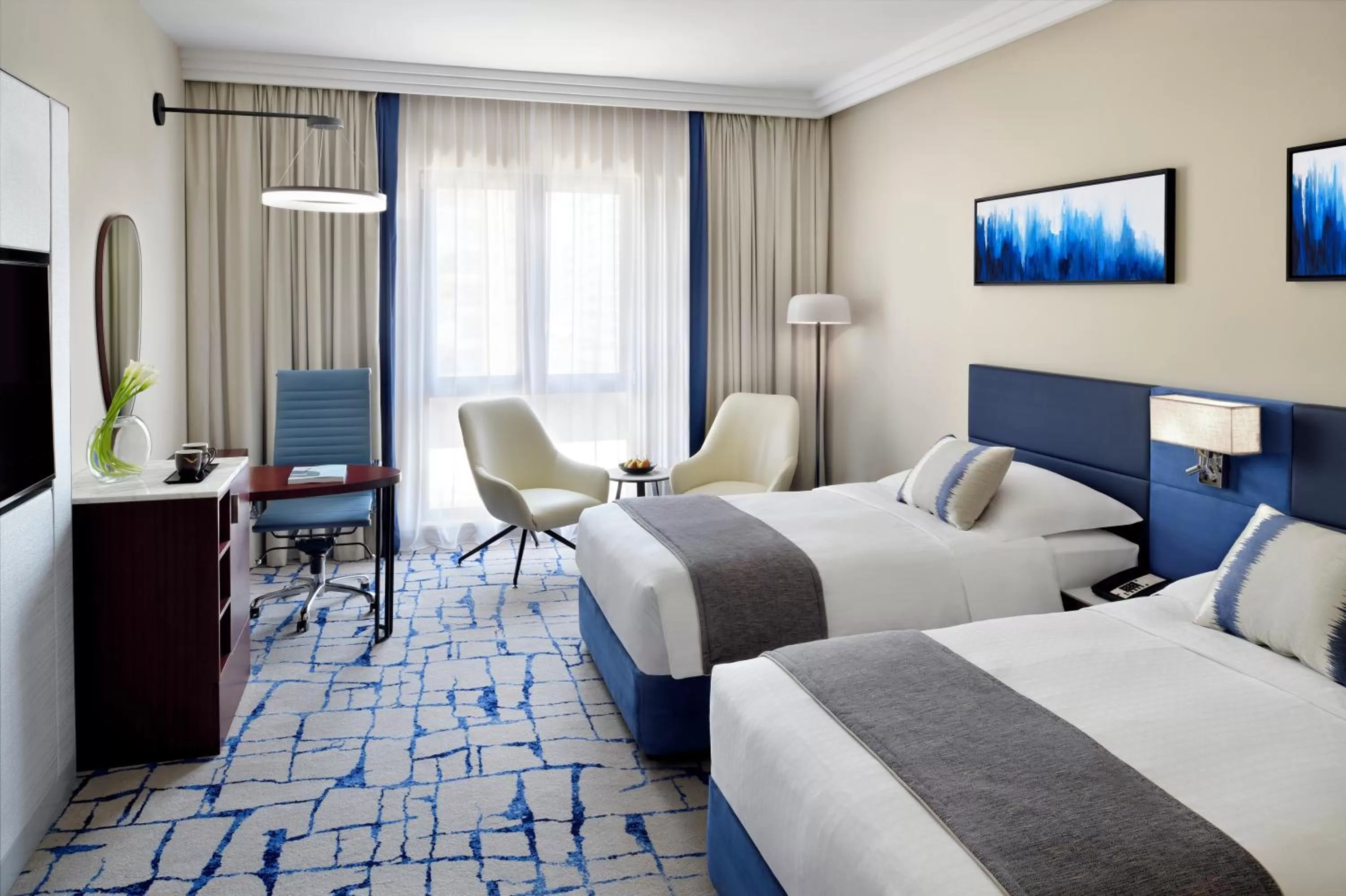 Bed in Mövenpick Hotel & Apartments Bur Dubai