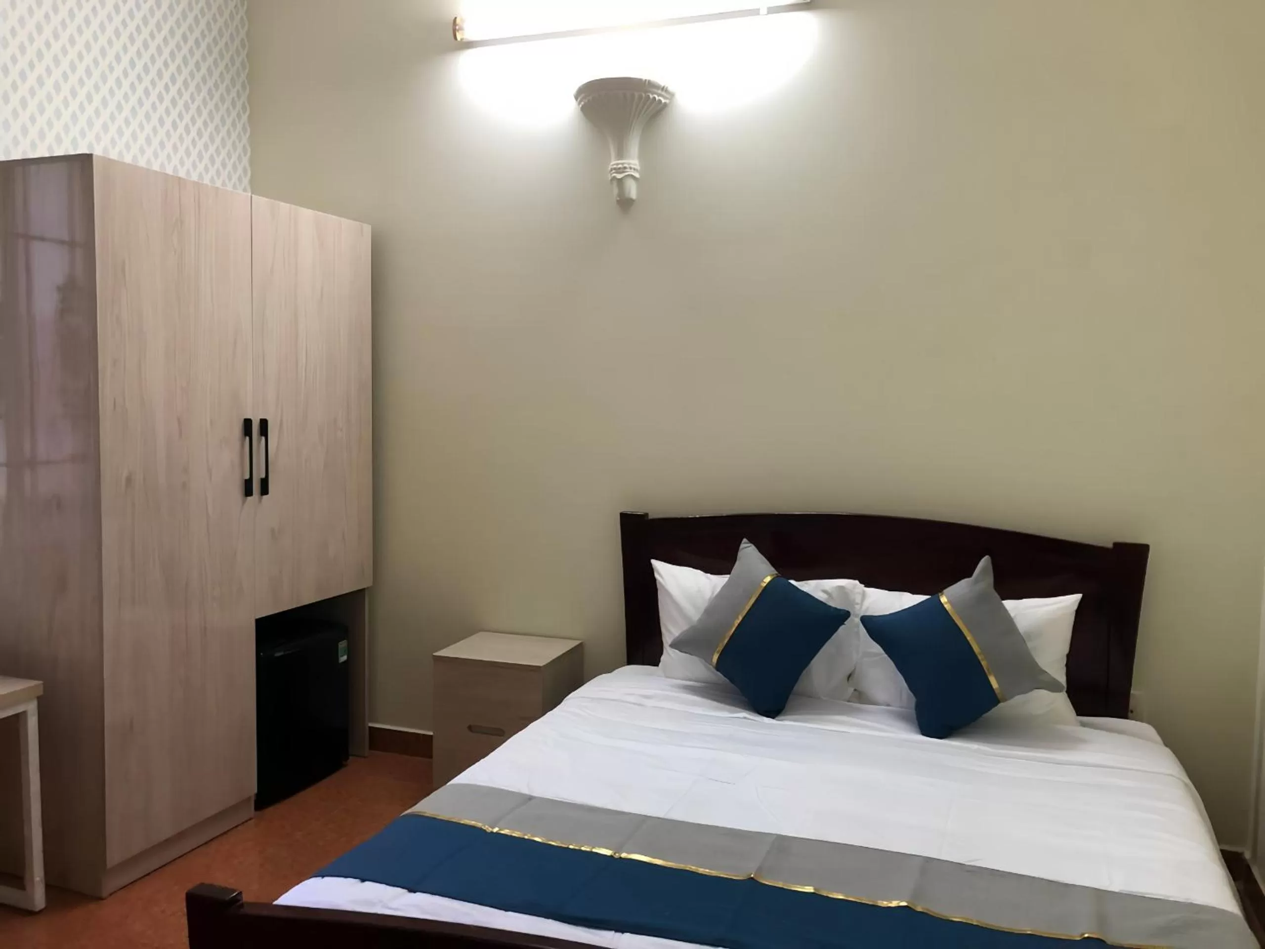 Bed in Chez Lotus Rose