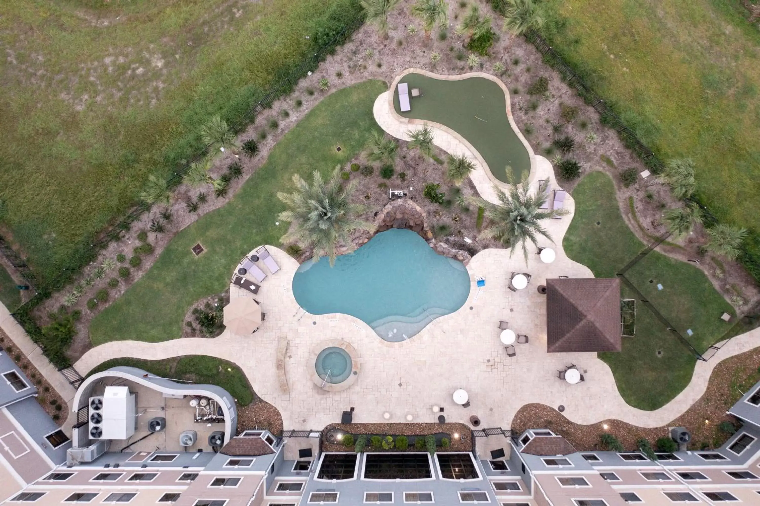 Pool view, Bird's-eye View in Staybridge Suites Houston-NASA Clear Lake, an IHG Hotel