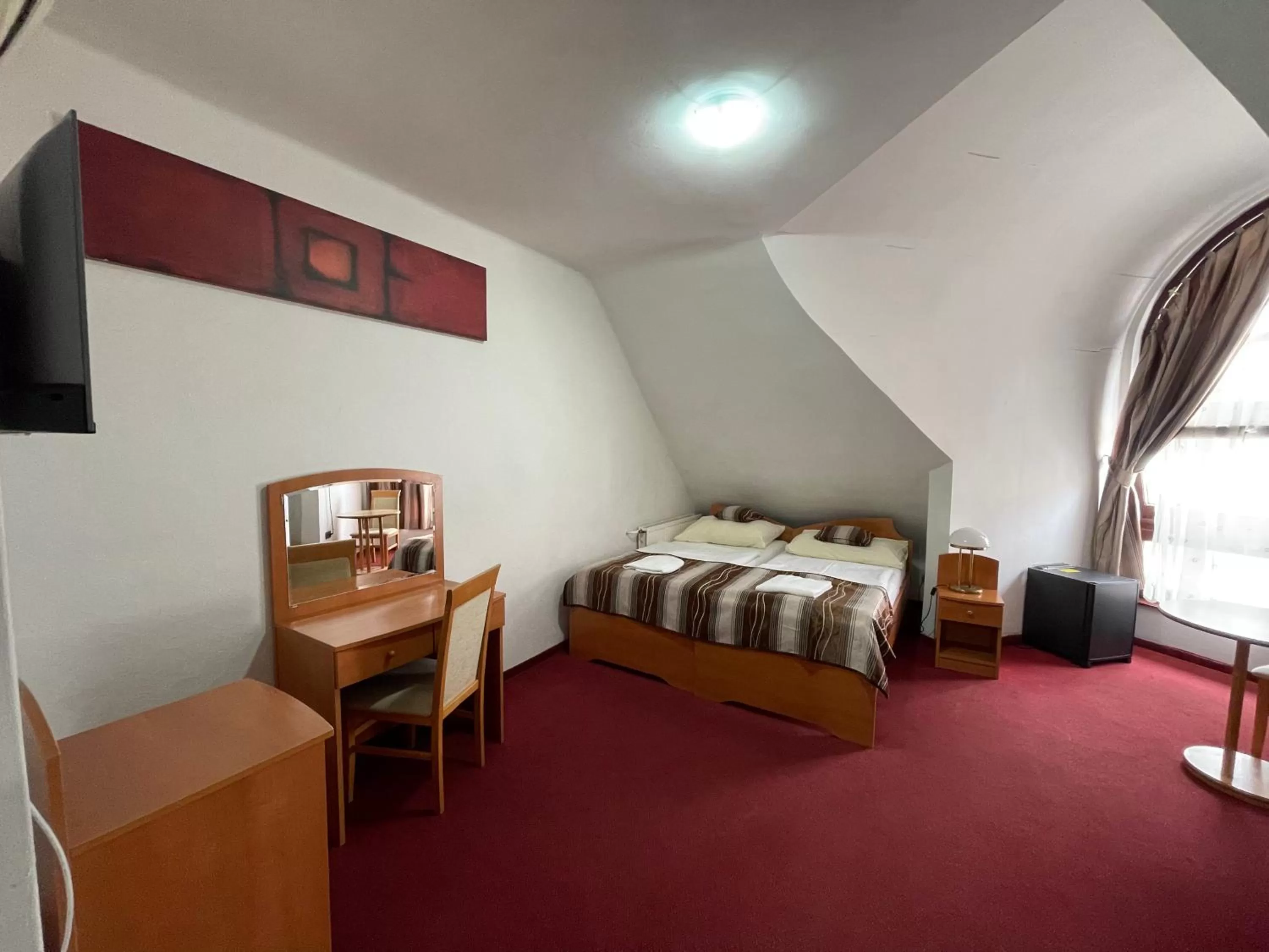 Bed in Hotel Minaret&Étterem