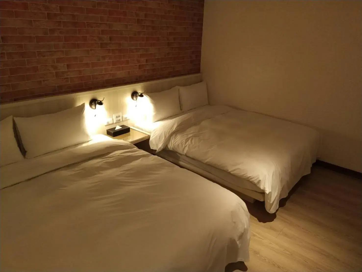 Bed in Sung Tai Hotel