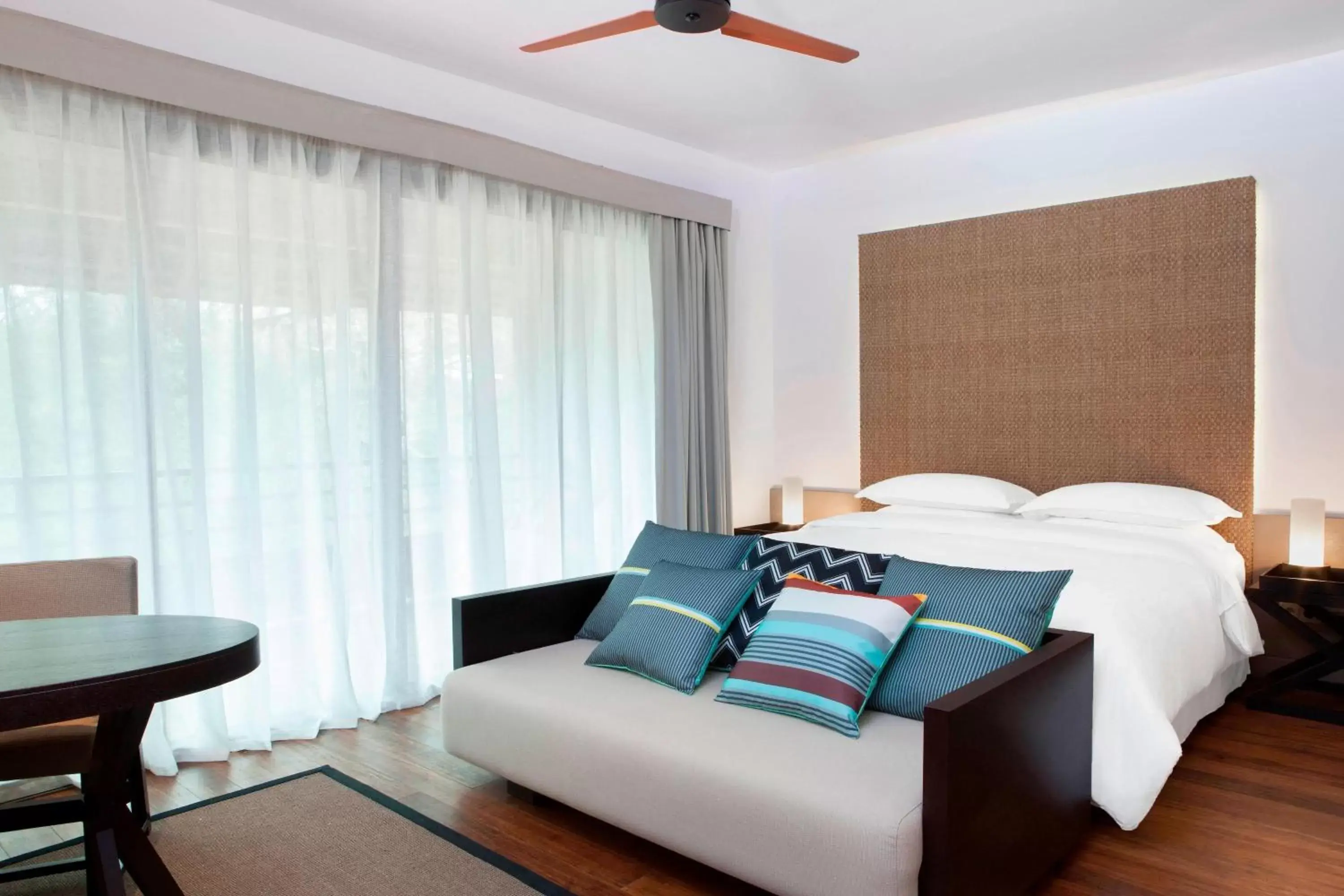 Photo of the whole room, Bed in Sheraton New Caledonia Deva Spa & Golf Resort