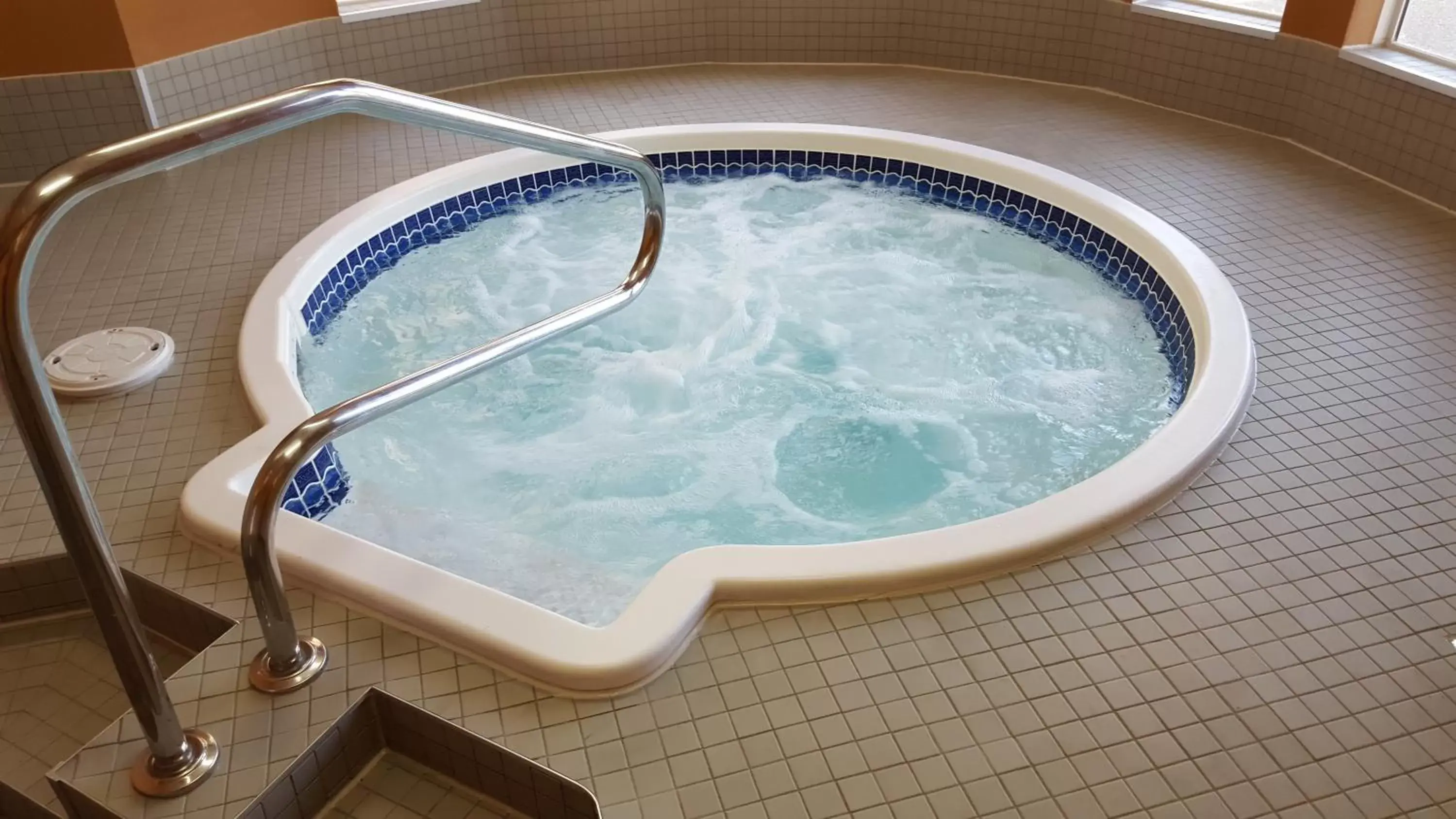 Hot Tub, Swimming Pool in SureStay Plus Hotel by Best Western Lethbridge