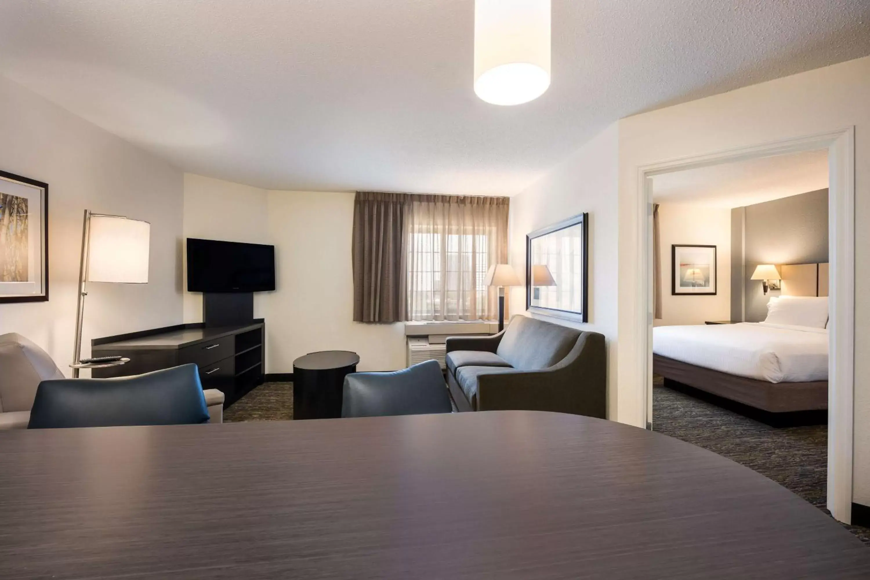 Living room, Bed in Sonesta Simply Suites Phoenix Glendale Living room, Bed in Sonesta Simply Suites Phoenix Glendale