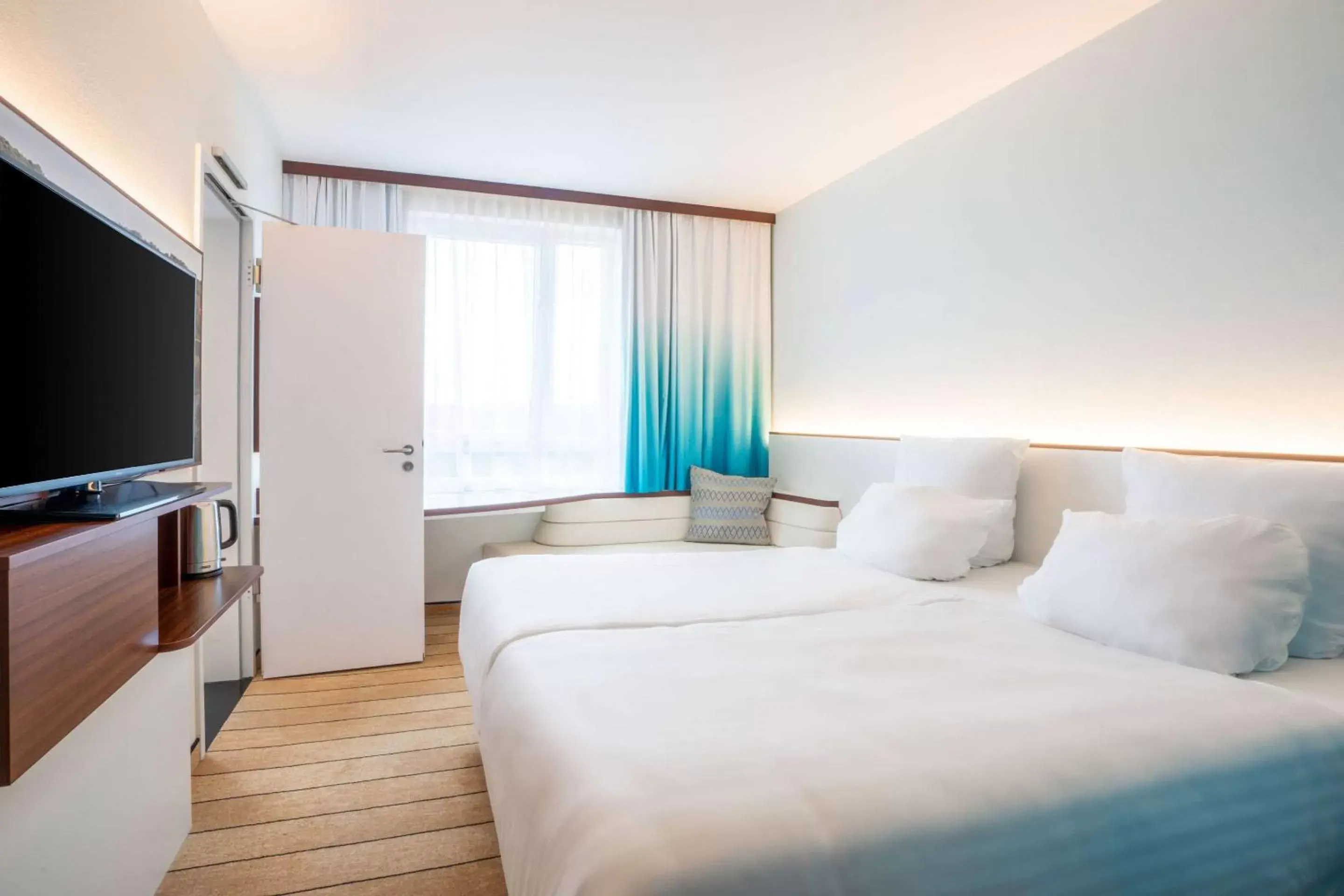 Photo of the whole room, Bed in Styles Hotel Frankfurt Airport