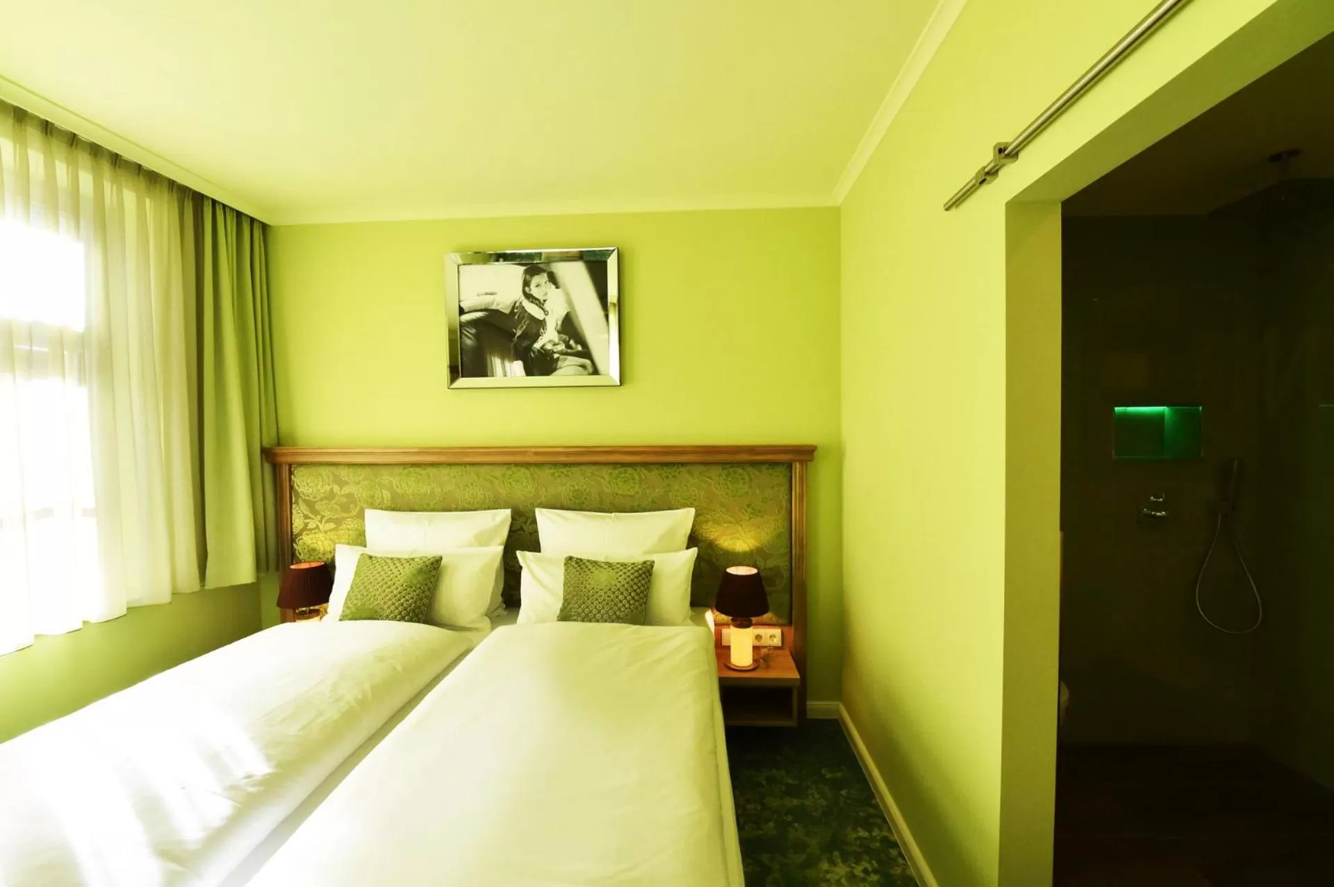 Photo of the whole room, Bed in MOMENTS Boutique Hotel