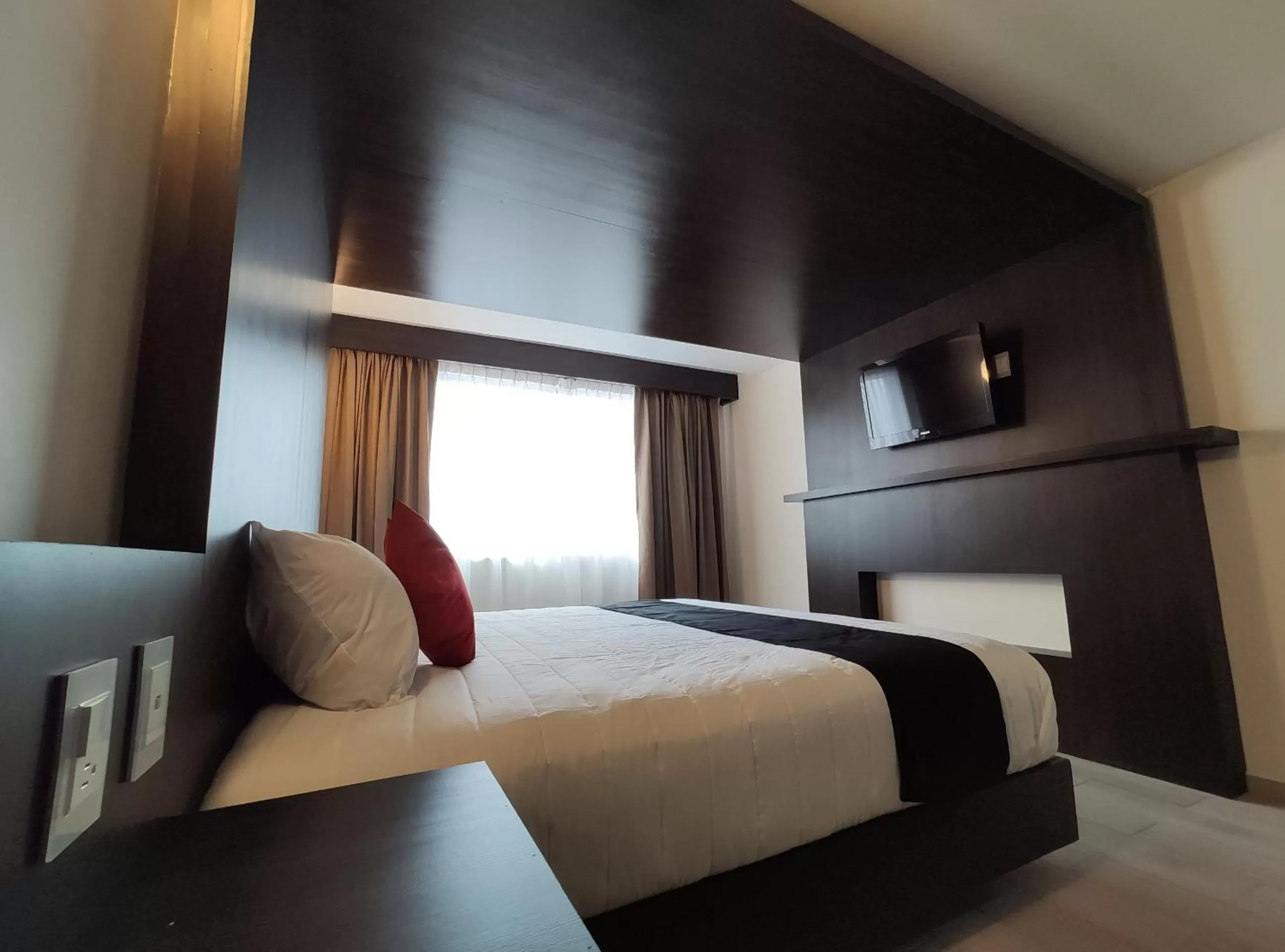 Bed in Hotel La Estancia Zacatlan