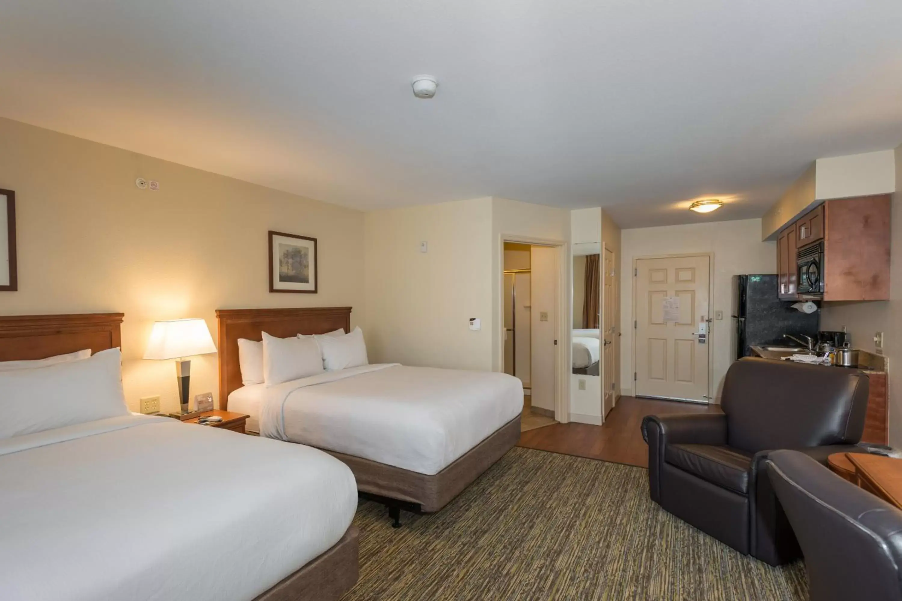 Bedroom in Candlewood Suites Mobile-Downtown, an IHG Hotel