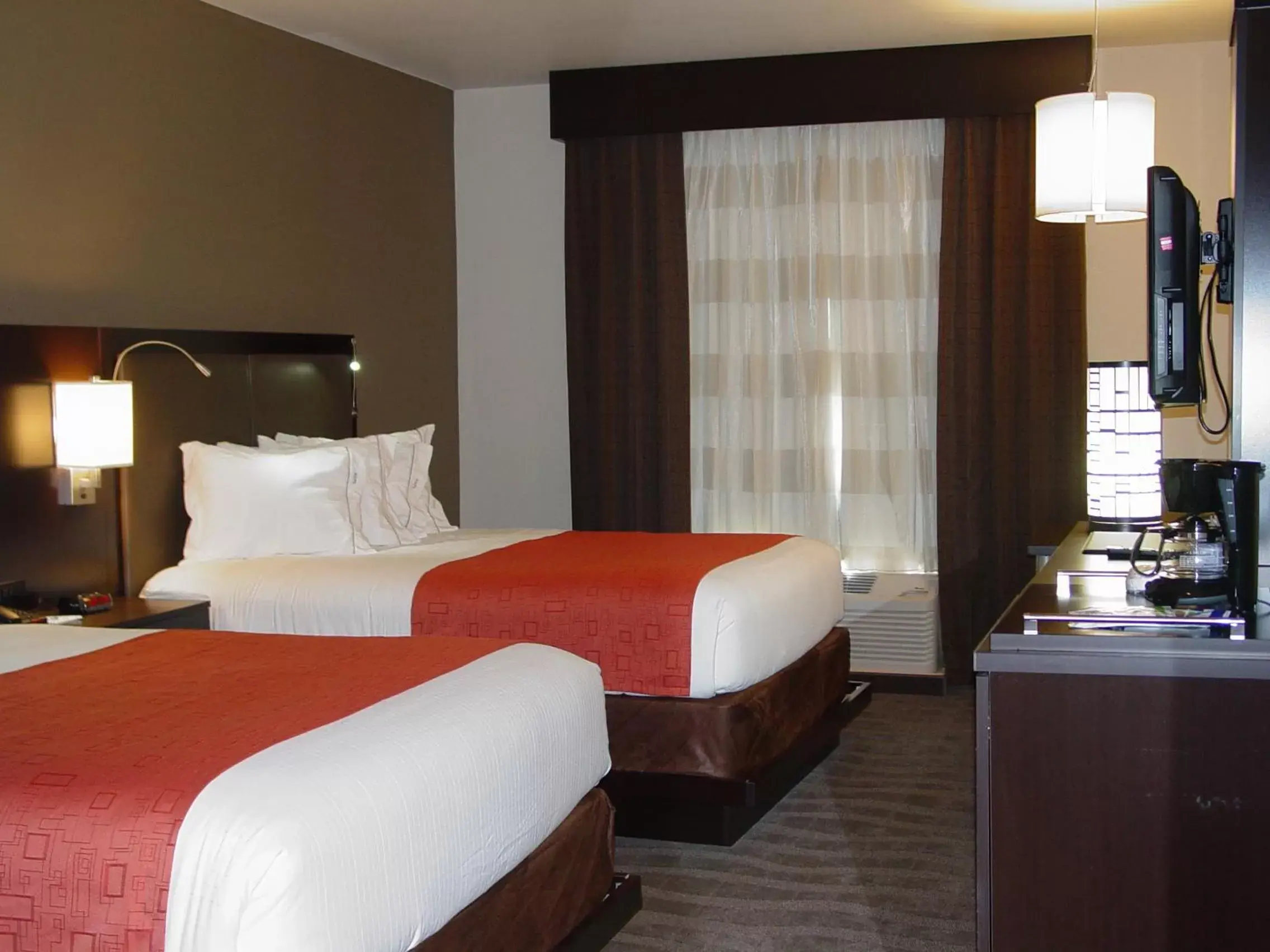 Bed in Holiday Inn Express Hotels & Suites Rockingham West, an IHG Hotel