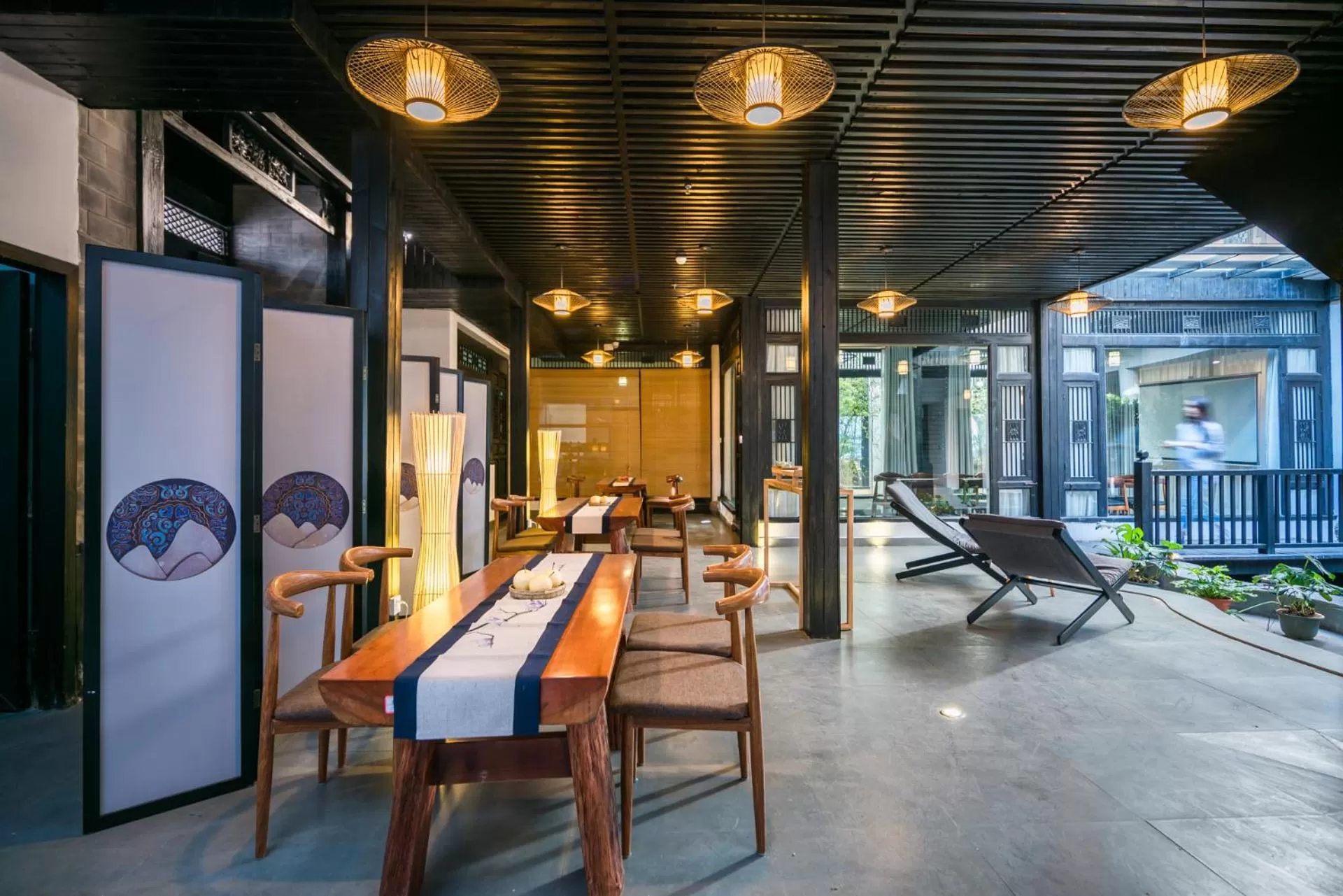 Communal lounge/ TV room in Lijiang Gemmer Hotel