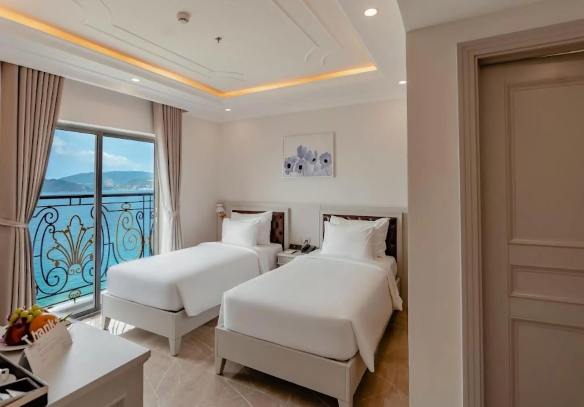 Bed in MerPerle Beach Hotel