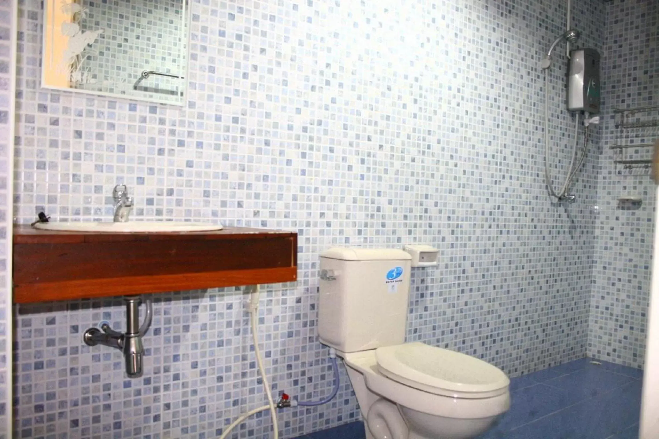 Bathroom in Pongphen Guesthouse - SHA Plus Certified