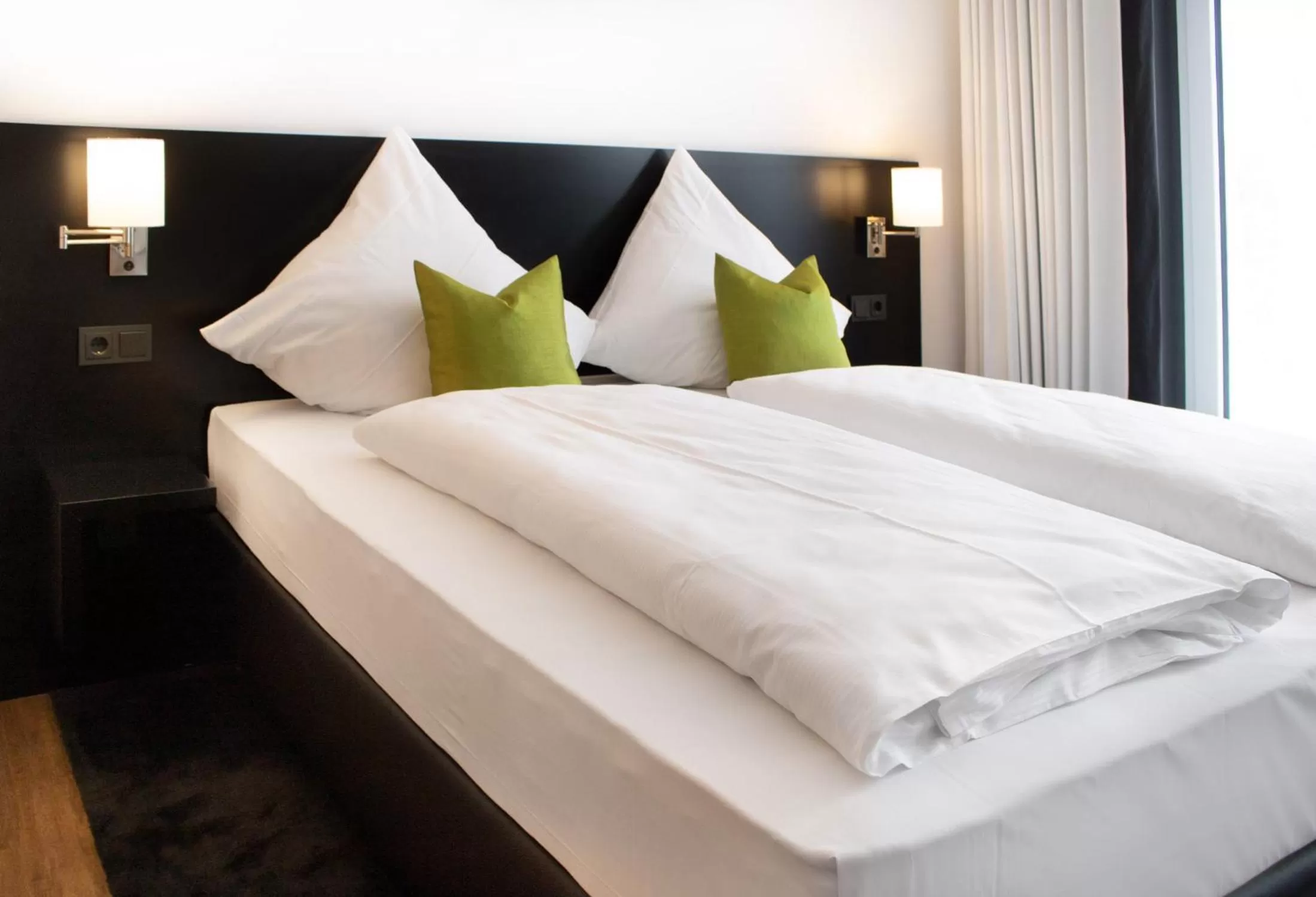 Bed in FZ Hotel by WMM Hotels