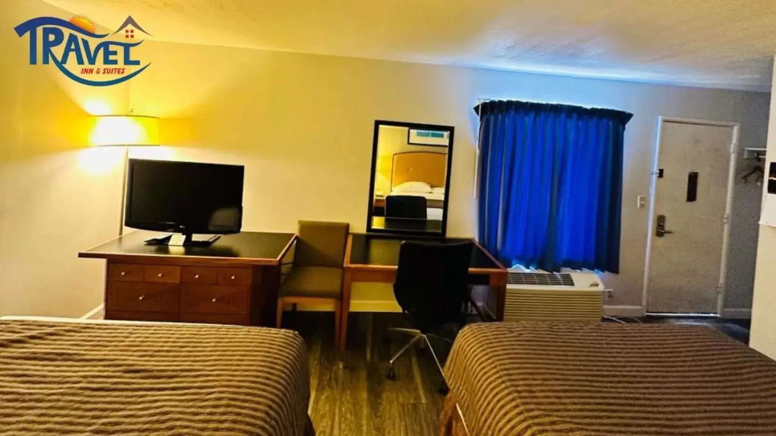 TV/Entertainment Center in Travel Inn & Suites