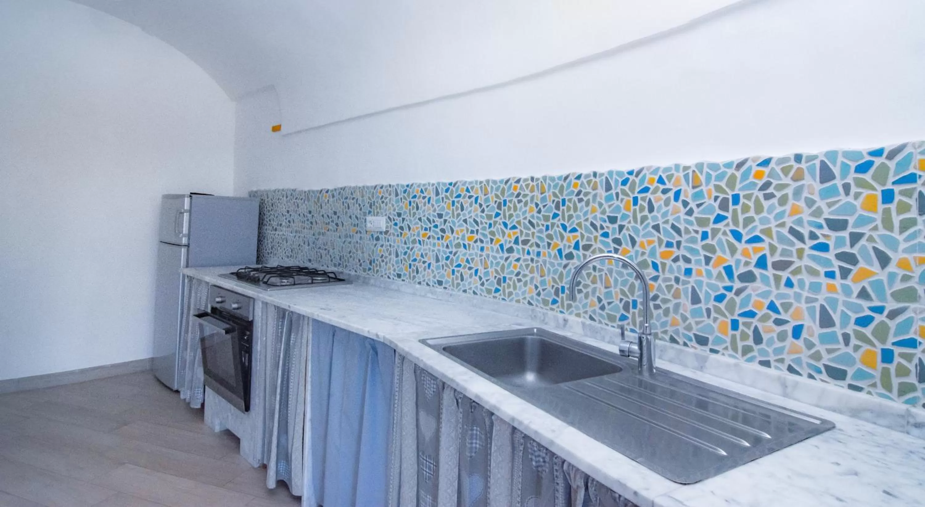 Kitchen or kitchenette in Villa Mariagiovanna