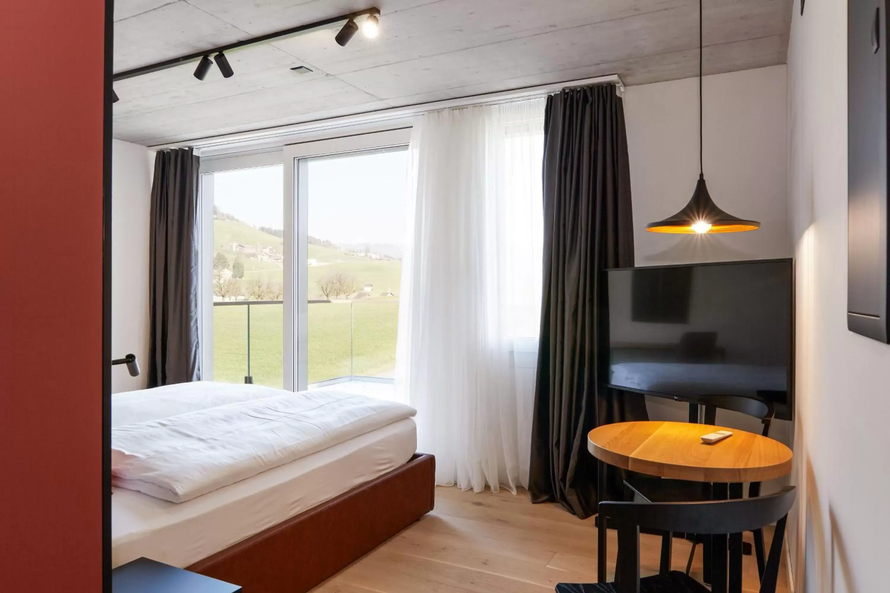 View (from property/room), Bed in Tailormade Hotel RIGIBLICK Küssnacht