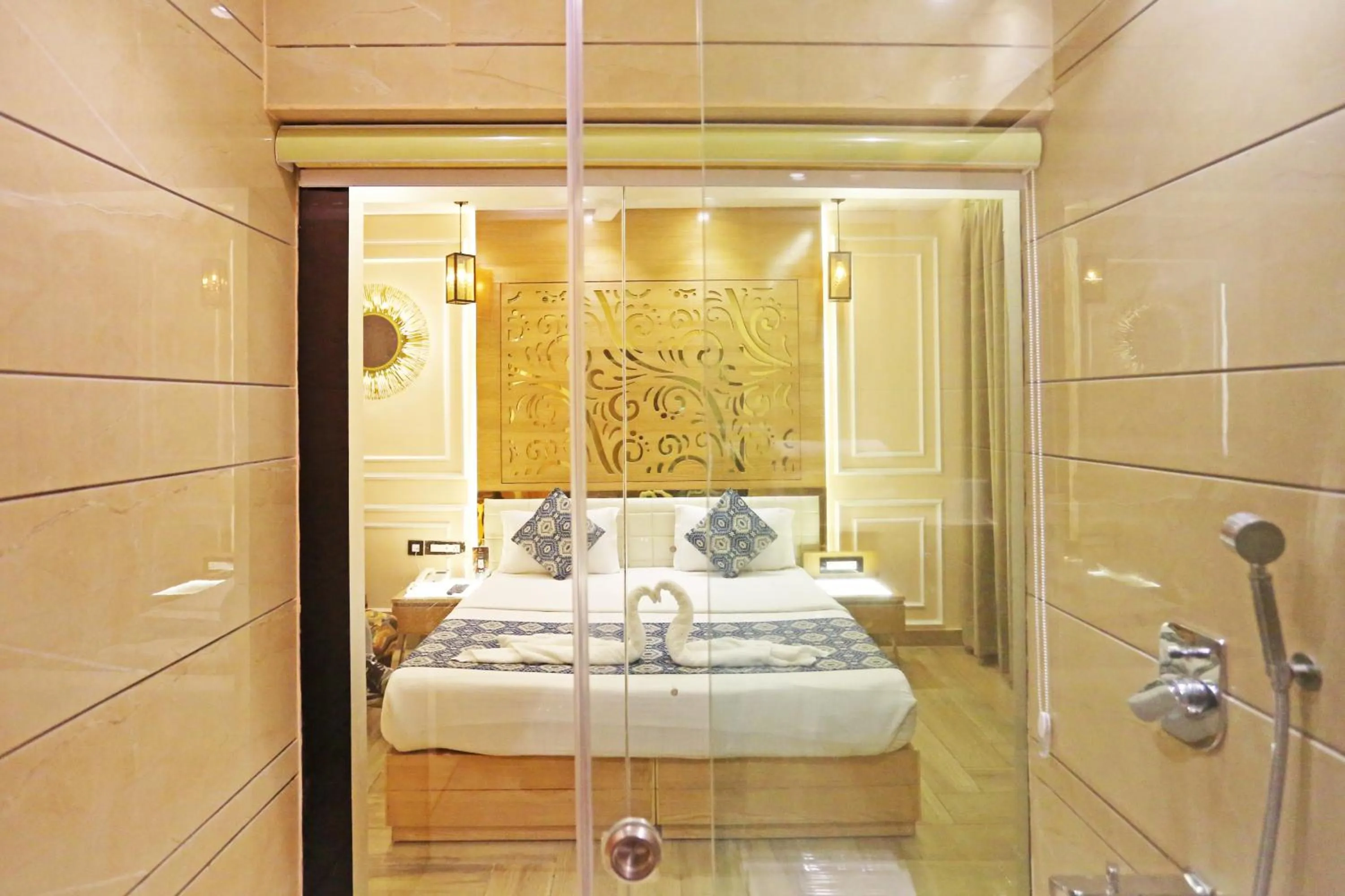 Bathroom, Bed in JRD Luxury-Business Hotel