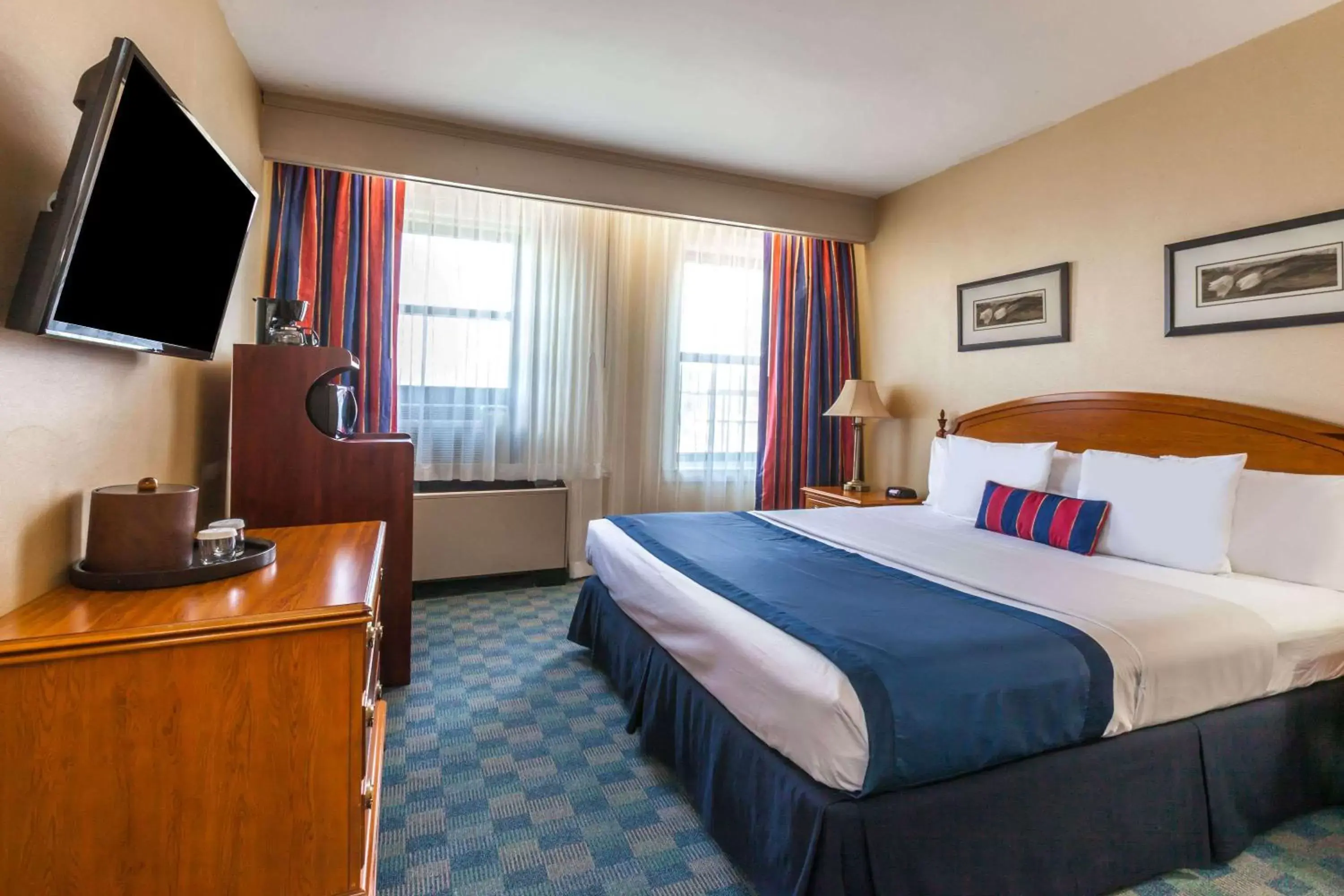 Photo of the whole room, Bed in Ramada by Wyndham Jersey City