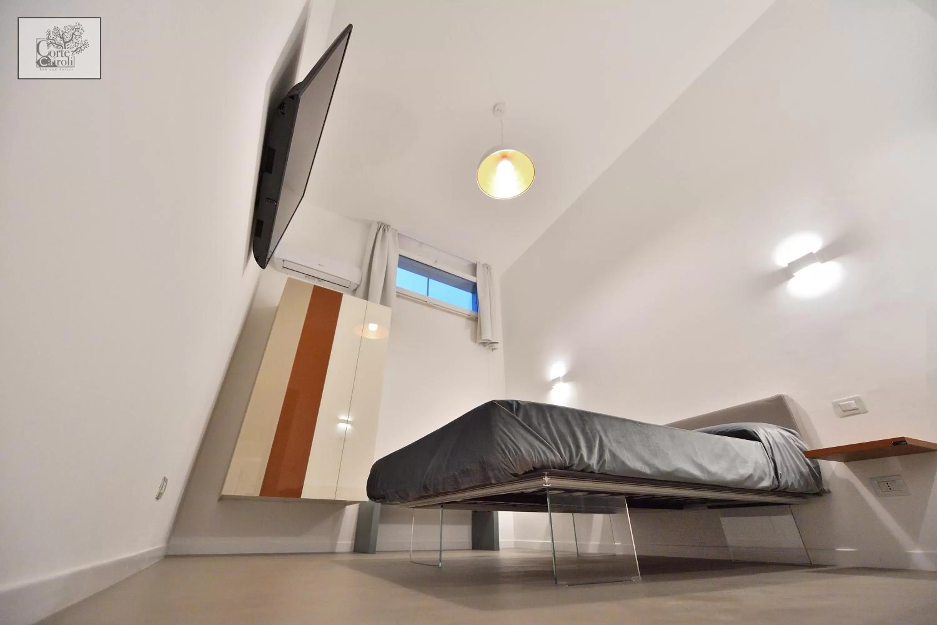 Bed in Corte Cairoli B&B and Suites