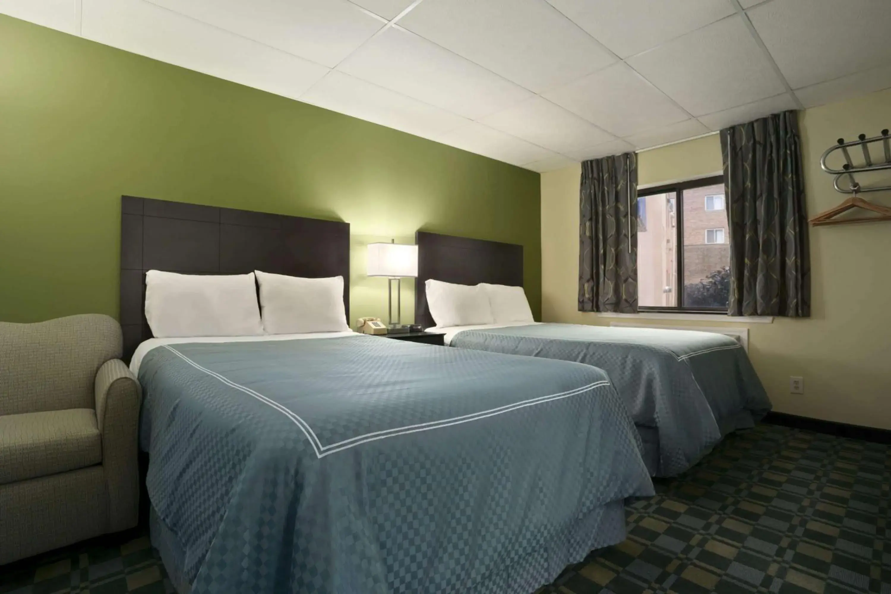 Photo of the whole room, Bed in Travelodge by Wyndham Cleveland Lakewood