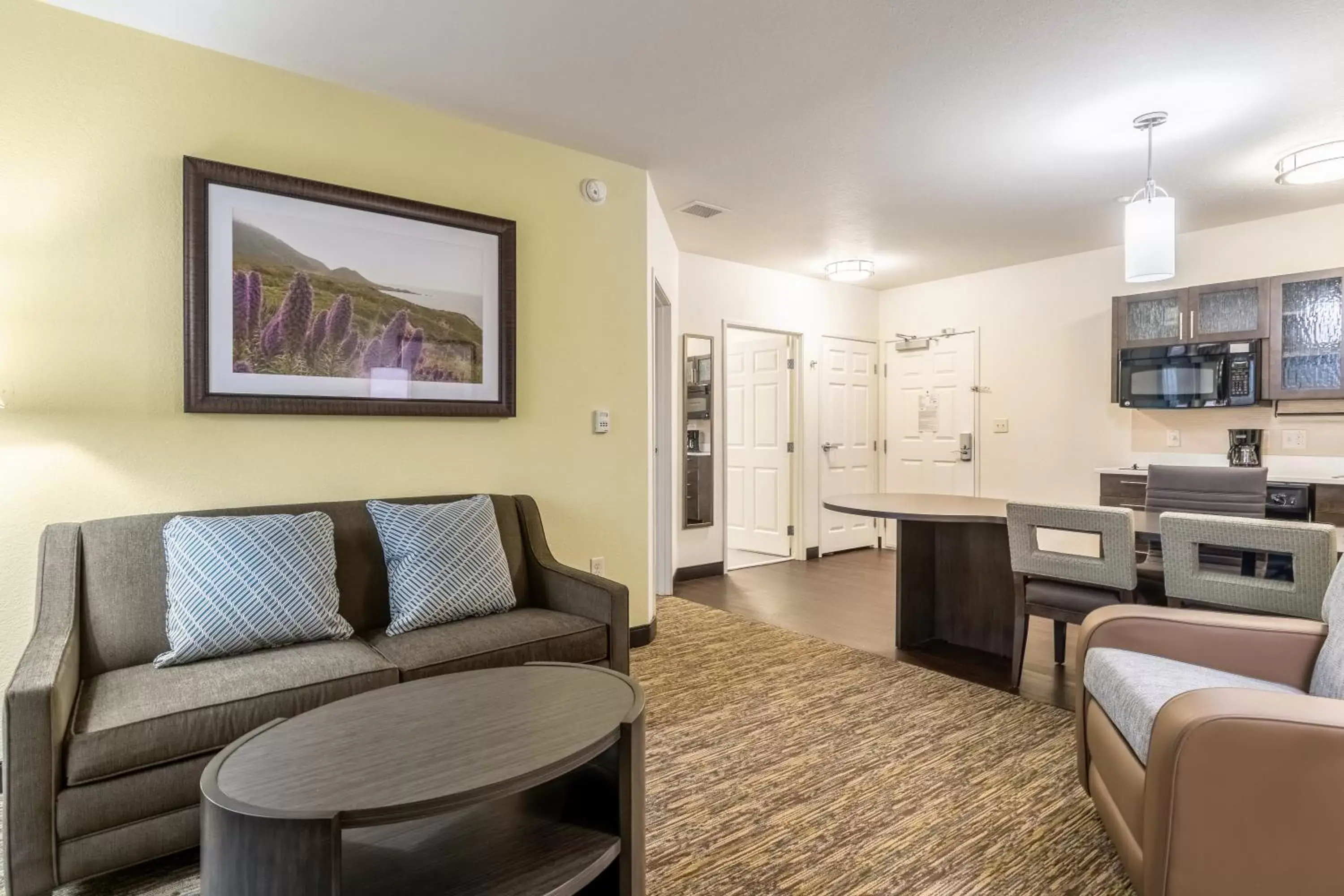 Bedroom, Seating Area in Candlewood Suites Portland Airport, an IHG Hotel