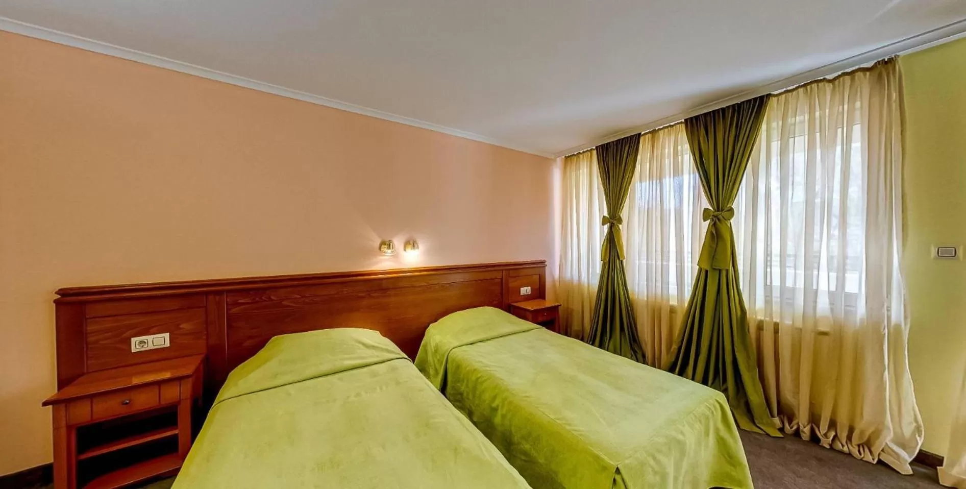 Bed in Troyan Plaza Hotel