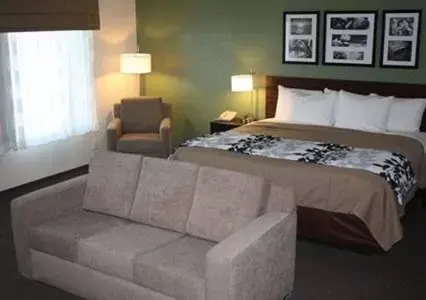 Decorative detail, Bed in Sleep Inn & Suites Garden City