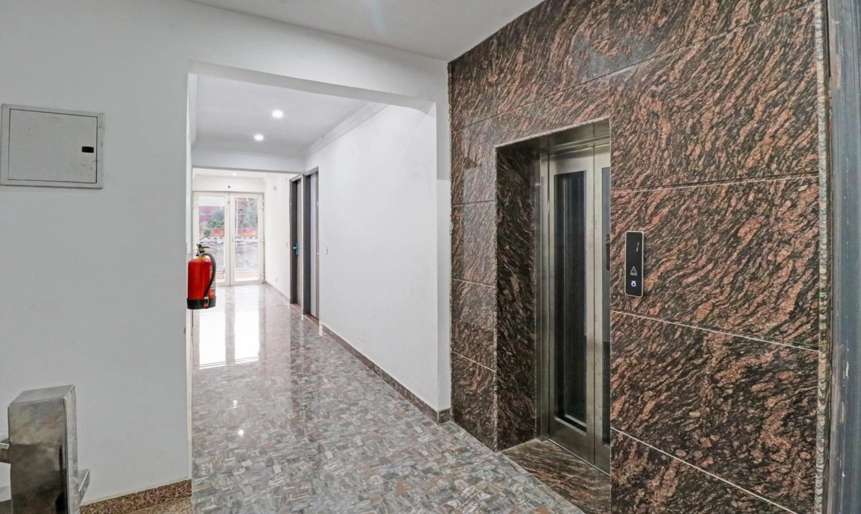 elevator in Treebo Grand Town House