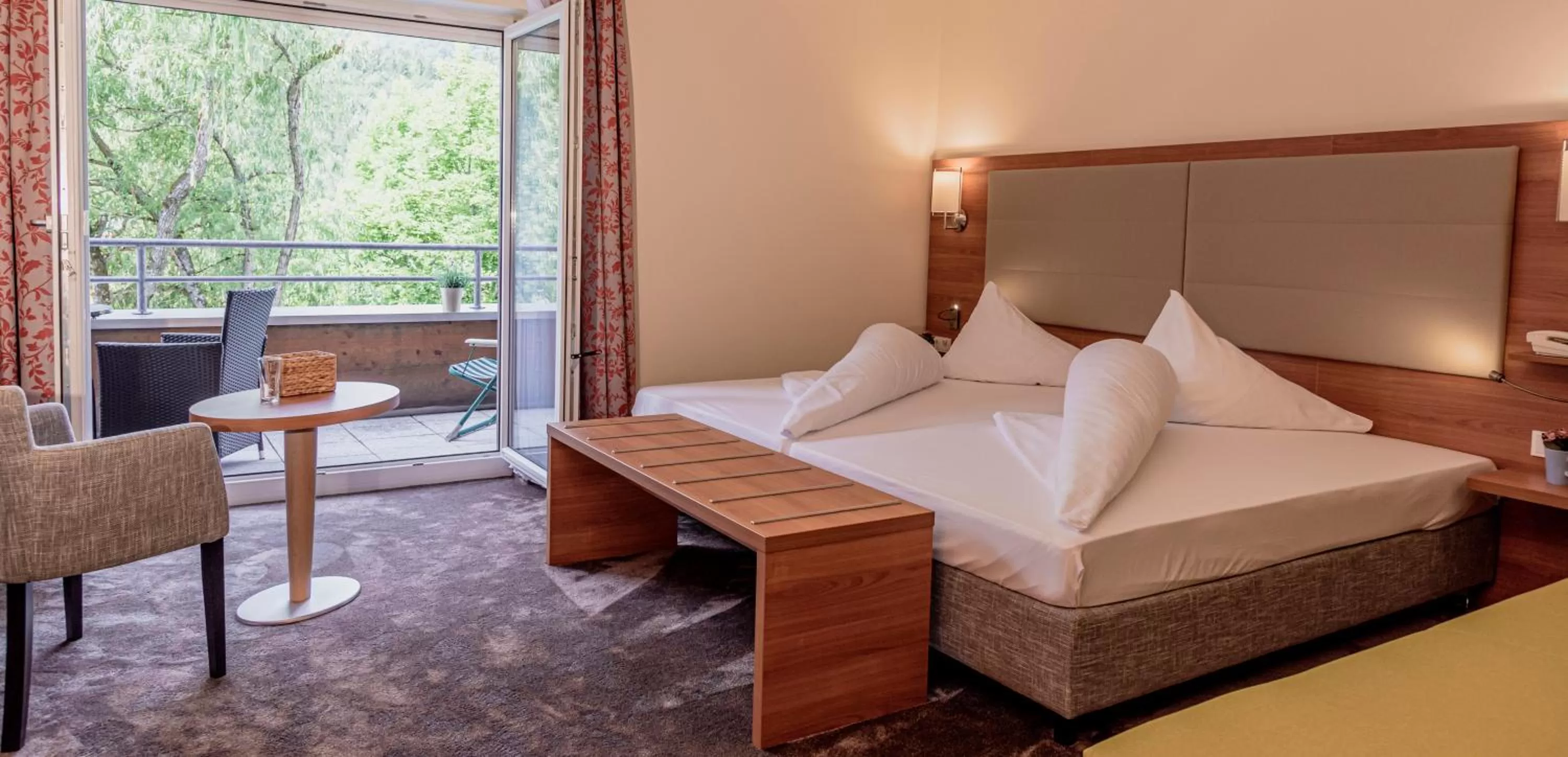 Bed in Wohlfühlhotel Goiserer Mühle