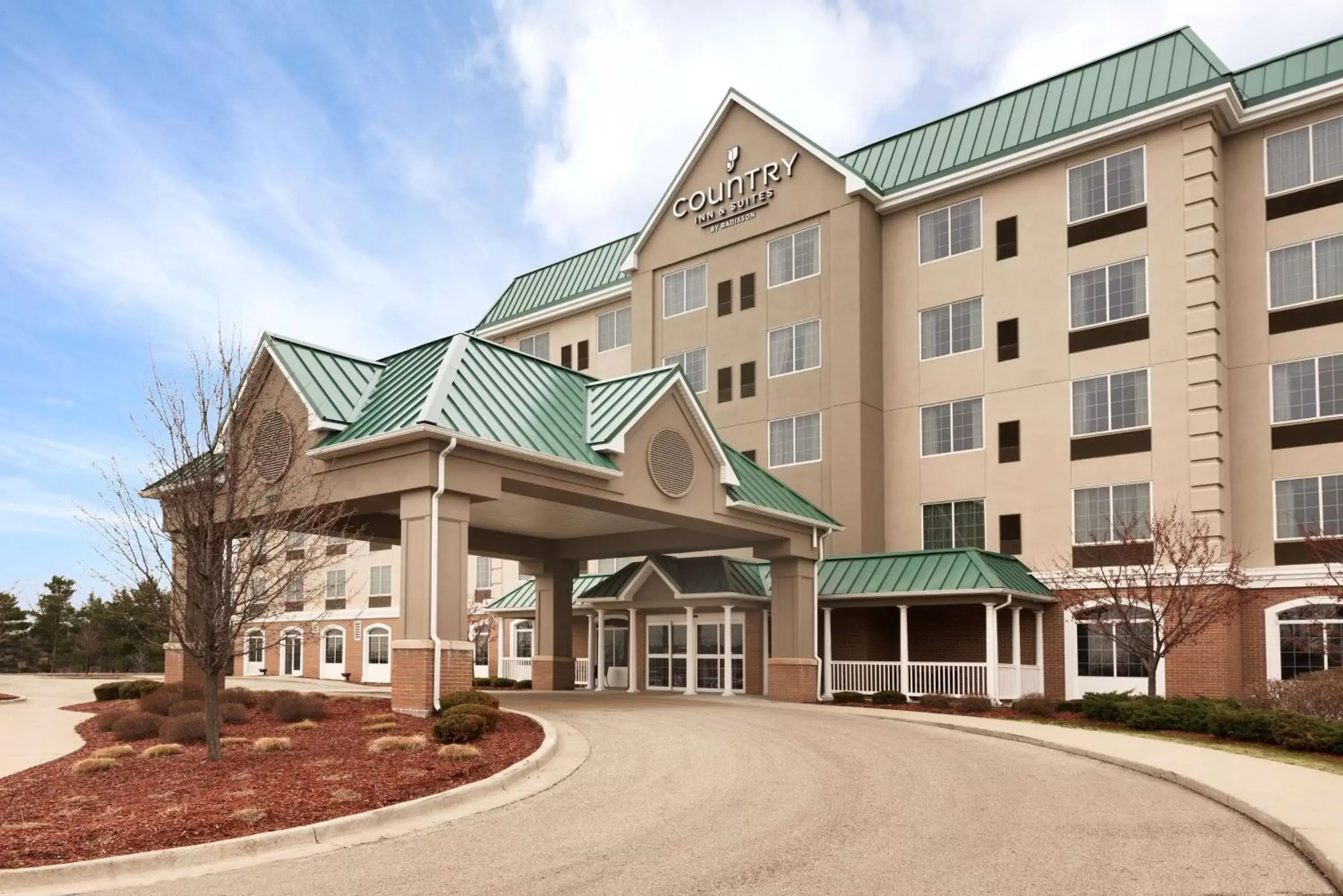 Property building in Country Inn & Suites by Radisson, Grand Rapids East, MI