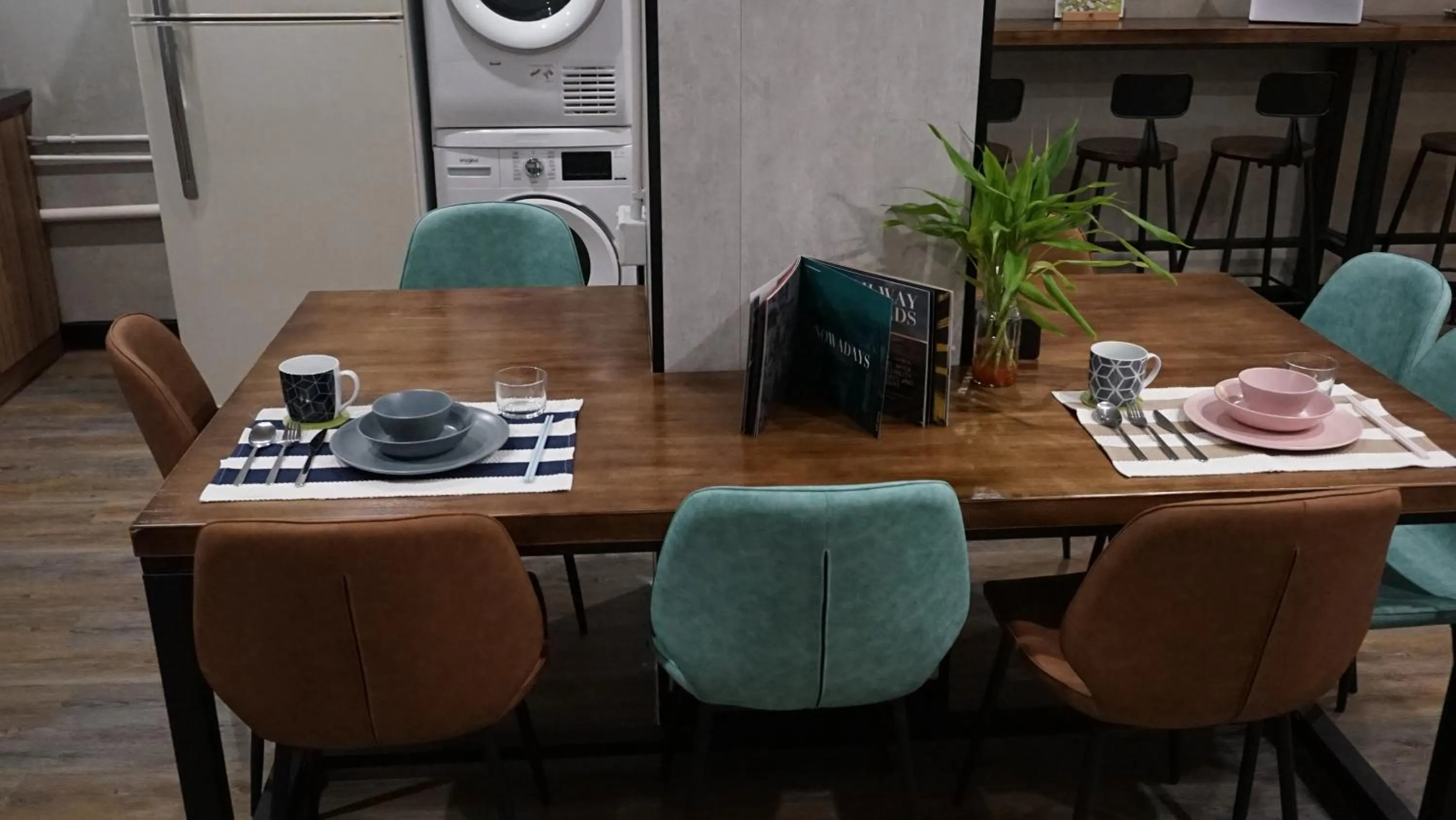 Communal lounge/ TV room in Homy Inn North Point