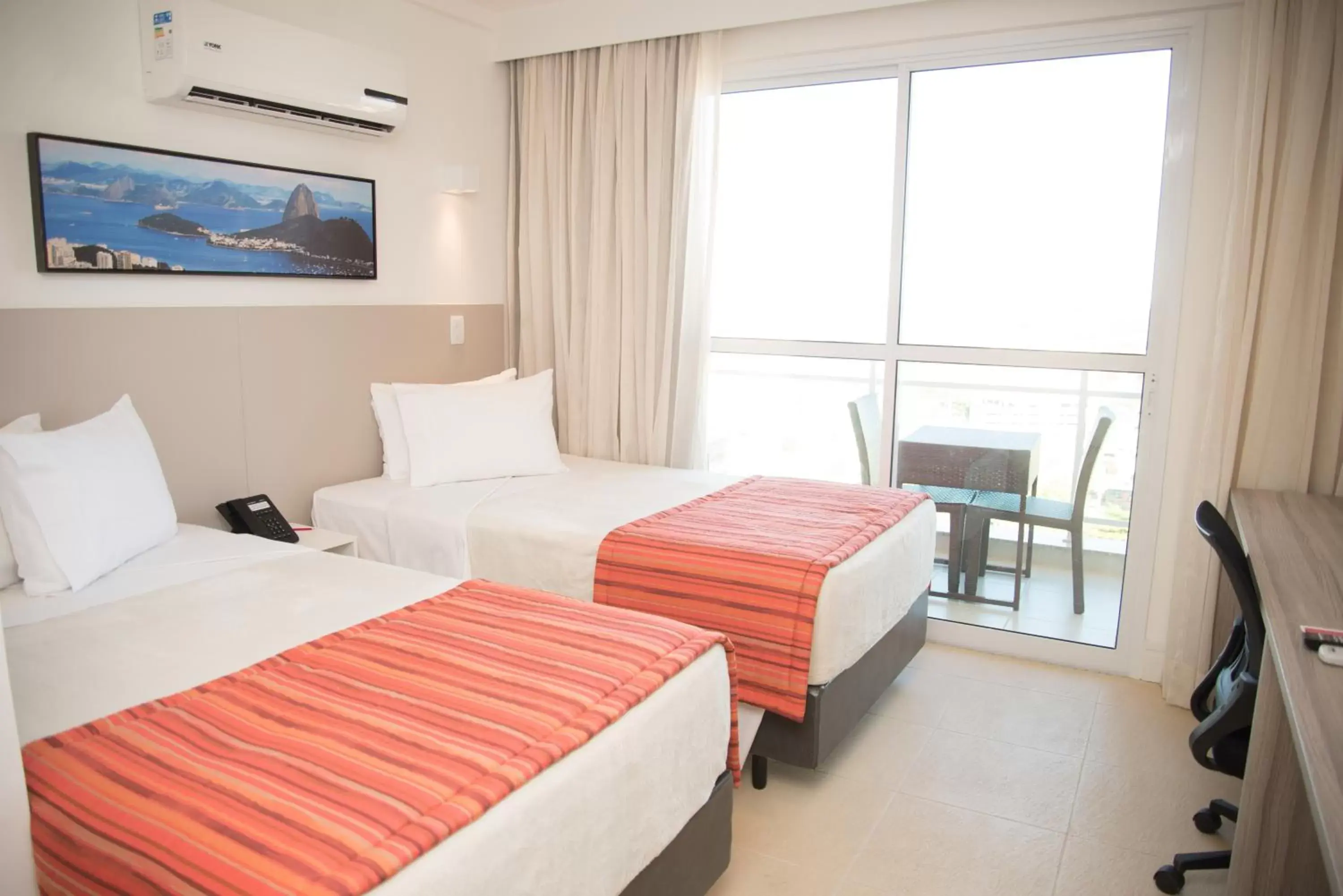 Bed in Ramada by Wyndham Macae Hotel & Suites Bed in Ramada by Wyndham Macae Hotel & Suites