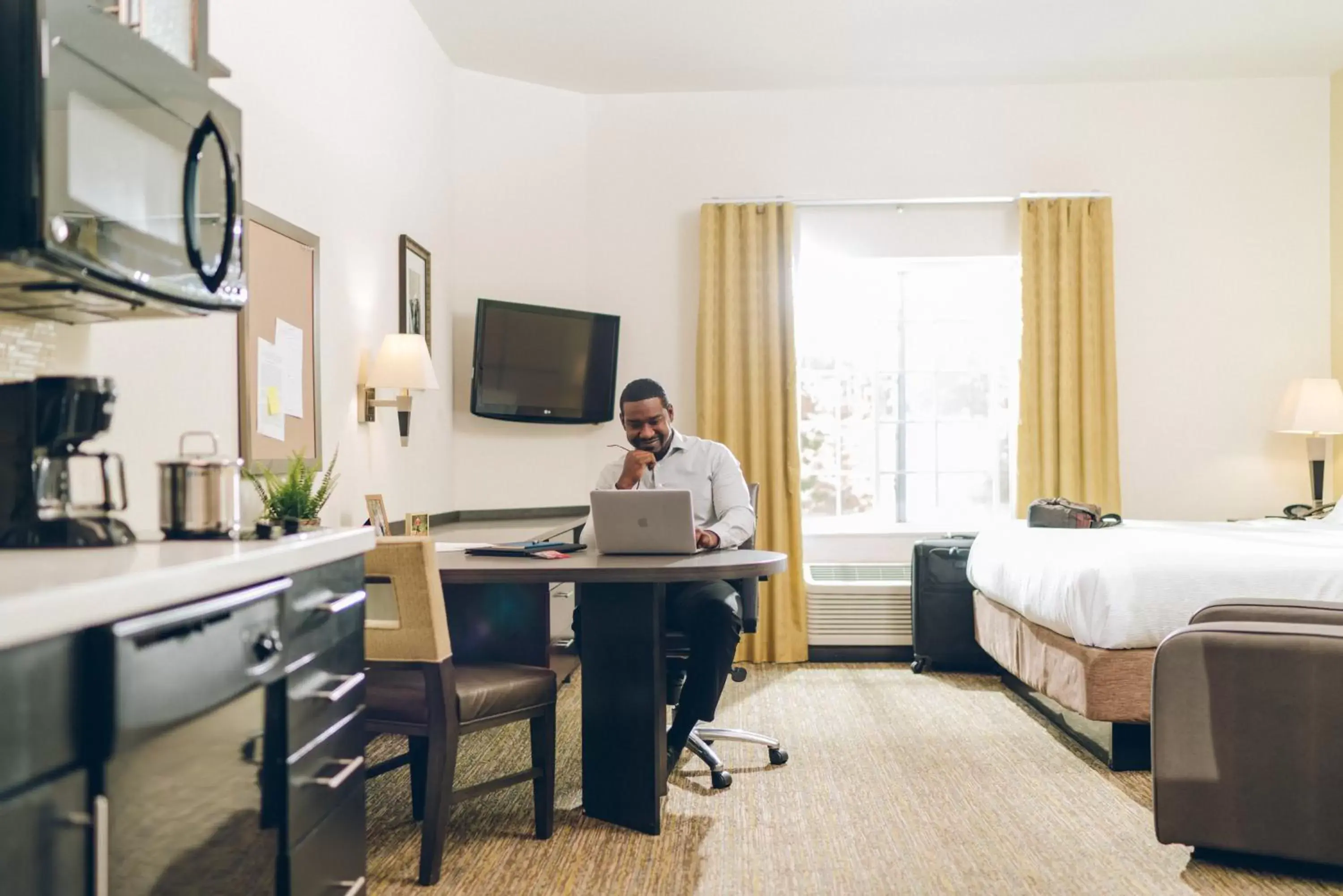 Photo of the whole room in Candlewood Suites Huntersville-Lake Norman Area, an IHG Hotel