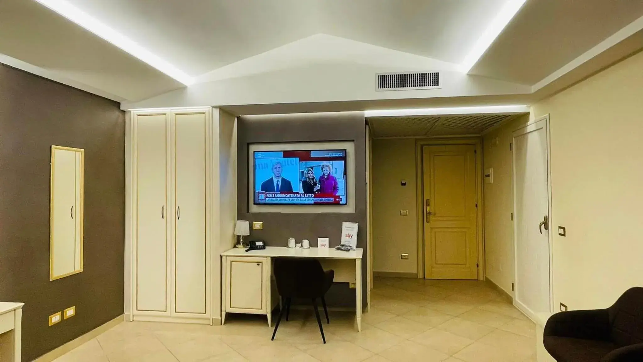 TV/Entertainment Center in Vittorio Emanuele Boutique Hotel