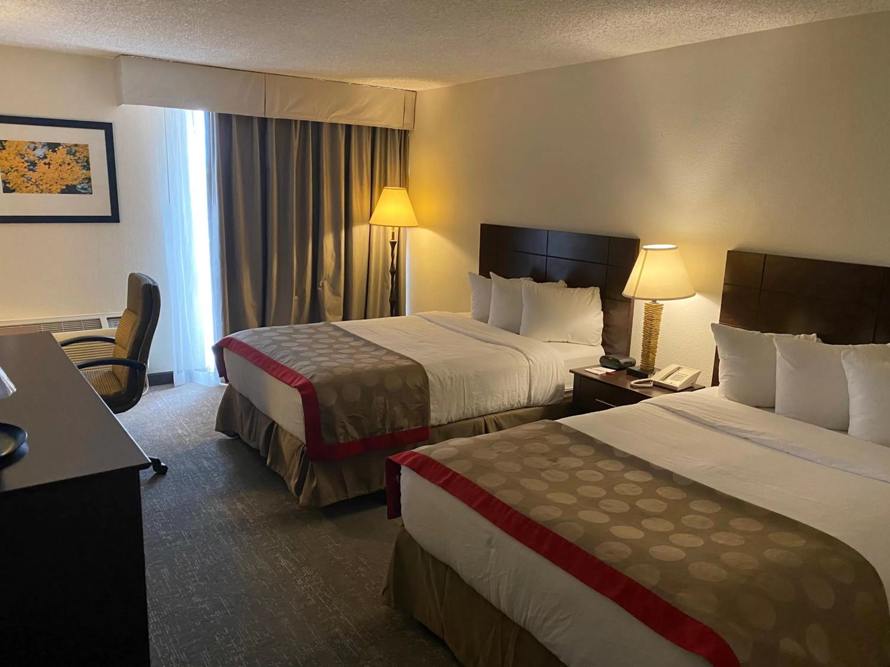 Bed in Ramada by Wyndham Albuquerque Midtown