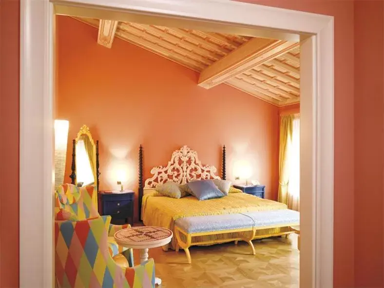 Bed in Byblos Art Hotel Villa Amistà