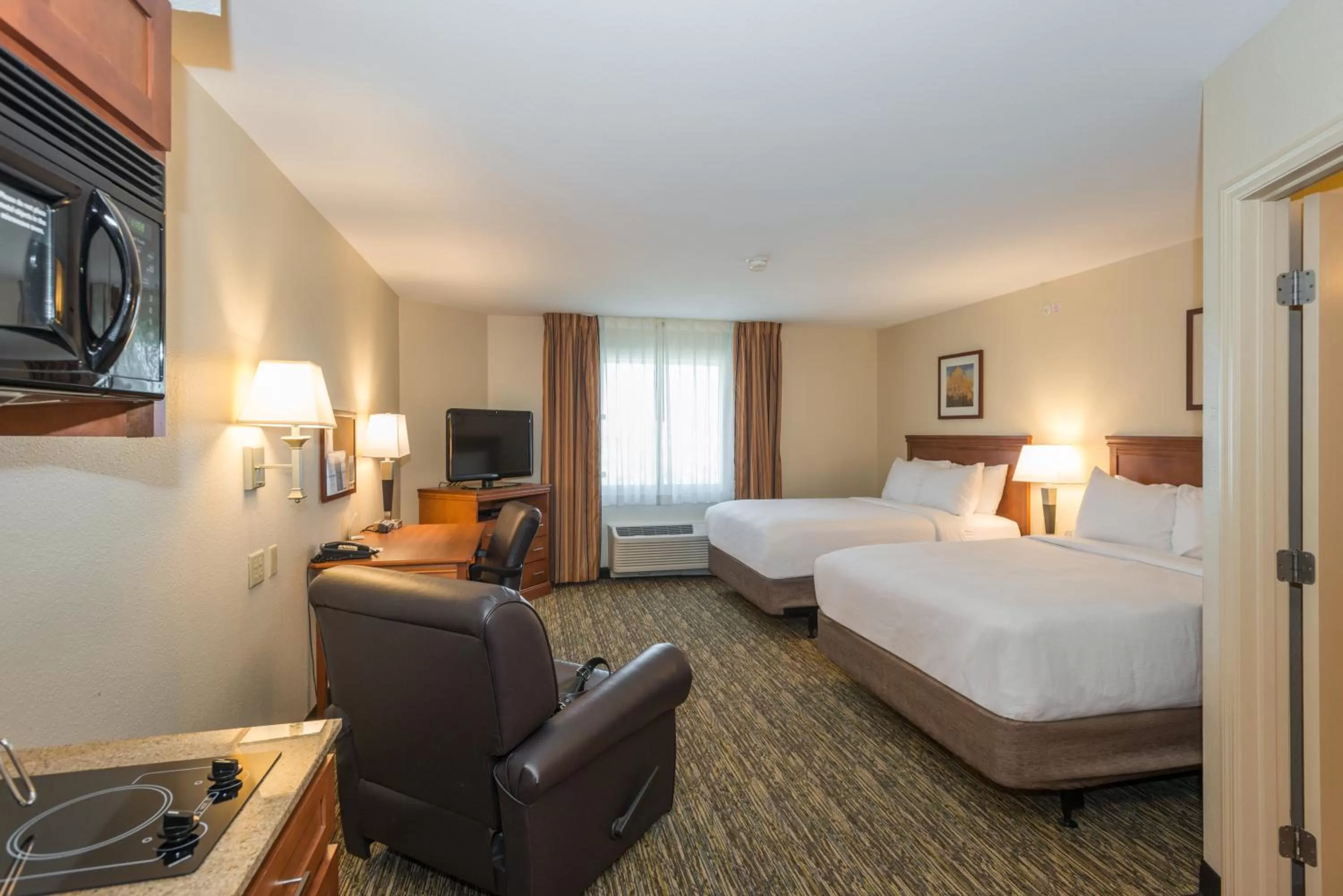 Photo of the whole room, Bed in Candlewood Suites Mobile-Downtown by IHG
